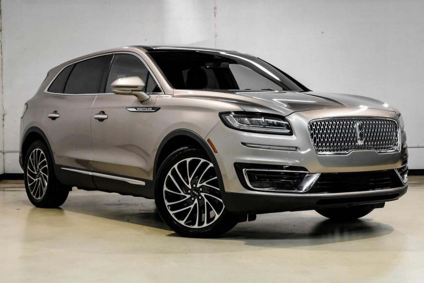 2019 Mocha /Ebony Lincoln Nautilus Reserve (2LMPJ6L98KB) with an 2.0L Turbocharged engine, Automatic transmission, located at 15300 Midway Rd., Addison, TX, 75001, (972) 702-0011, 32.958321, -96.838074 - 2019 Lincoln Nautilus Reserve<br><br>Now Available at Midway Auto Group, Addison, Texas<br><br>Luxurious, powerful, and exceptionally refined the 2019 Lincoln Nautilus Reserve represents the peak of Lincoln's midsize SUV craftsmanship. With its premium interior materials, smooth twin-turbocharged pe - Photo#8