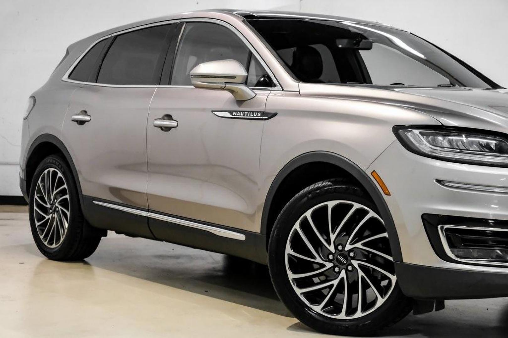 2019 Mocha /Ebony Lincoln Nautilus Reserve (2LMPJ6L98KB) with an 2.0L Turbocharged engine, Automatic transmission, located at 15300 Midway Rd., Addison, TX, 75001, (972) 702-0011, 32.958321, -96.838074 - 2019 Lincoln Nautilus Reserve<br><br>Now Available at Midway Auto Group, Addison, Texas<br><br>Luxurious, powerful, and exceptionally refined the 2019 Lincoln Nautilus Reserve represents the peak of Lincoln's midsize SUV craftsmanship. With its premium interior materials, smooth twin-turbocharged pe - Photo#9