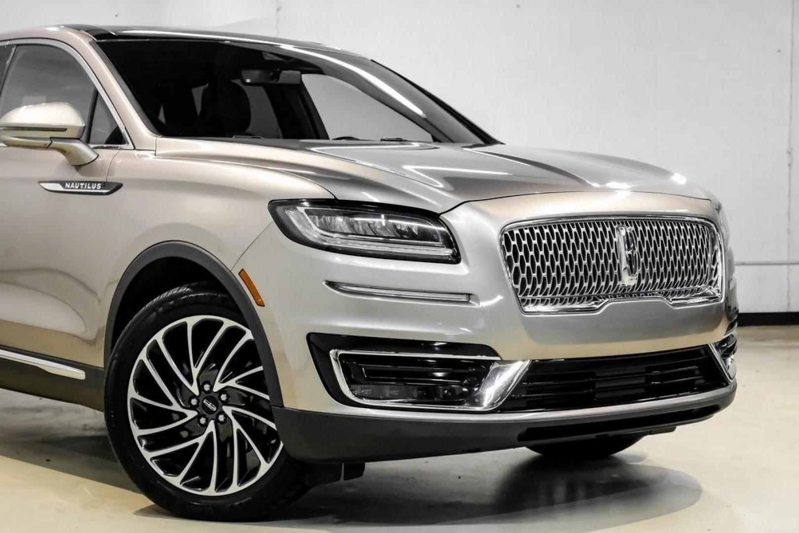2019 Mocha /Ebony Lincoln Nautilus Reserve (2LMPJ6L98KB) with an 2.0L Turbocharged engine, Automatic transmission, located at 15300 Midway Rd., Addison, TX, 75001, (972) 702-0011, 32.958321, -96.838074 - 2019 Lincoln Nautilus Reserve<br><br>Now Available at Midway Auto Group, Addison, Texas<br><br>Luxurious, powerful, and exceptionally refined the 2019 Lincoln Nautilus Reserve represents the peak of Lincoln's midsize SUV craftsmanship. With its premium interior materials, smooth twin-turbocharged pe - Photo#10