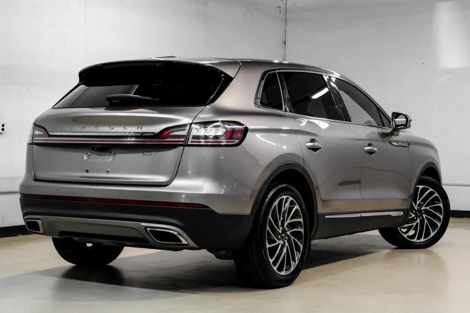 2019 Mocha /Ebony Lincoln Nautilus Reserve (2LMPJ6L98KB) with an 2.0L Turbocharged engine, Automatic transmission, located at 15300 Midway Rd., Addison, TX, 75001, (972) 702-0011, 32.958321, -96.838074 - 2019 Lincoln Nautilus Reserve<br><br>Now Available at Midway Auto Group, Addison, Texas<br><br>Luxurious, powerful, and exceptionally refined the 2019 Lincoln Nautilus Reserve represents the peak of Lincoln's midsize SUV craftsmanship. With its premium interior materials, smooth twin-turbocharged pe - Photo#12
