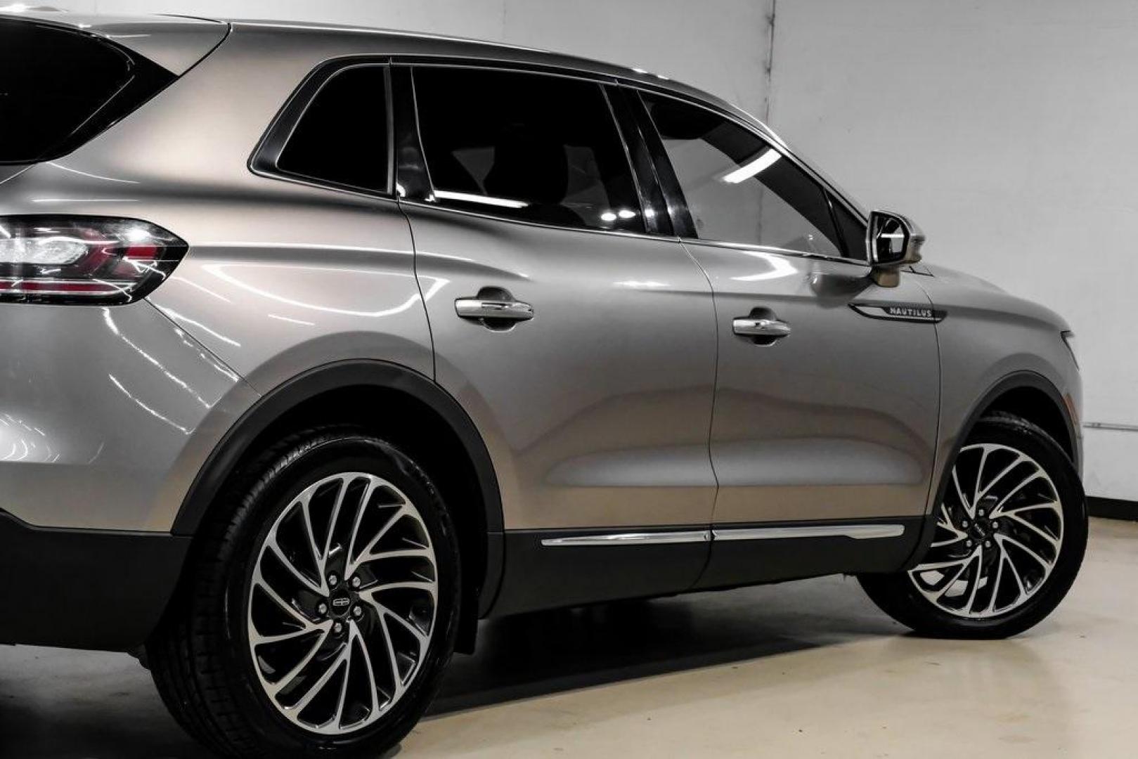 2019 Mocha /Ebony Lincoln Nautilus Reserve (2LMPJ6L98KB) with an 2.0L Turbocharged engine, Automatic transmission, located at 15300 Midway Rd., Addison, TX, 75001, (972) 702-0011, 32.958321, -96.838074 - 2019 Lincoln Nautilus Reserve<br><br>Now Available at Midway Auto Group, Addison, Texas<br><br>Luxurious, powerful, and exceptionally refined the 2019 Lincoln Nautilus Reserve represents the peak of Lincoln's midsize SUV craftsmanship. With its premium interior materials, smooth twin-turbocharged pe - Photo#14