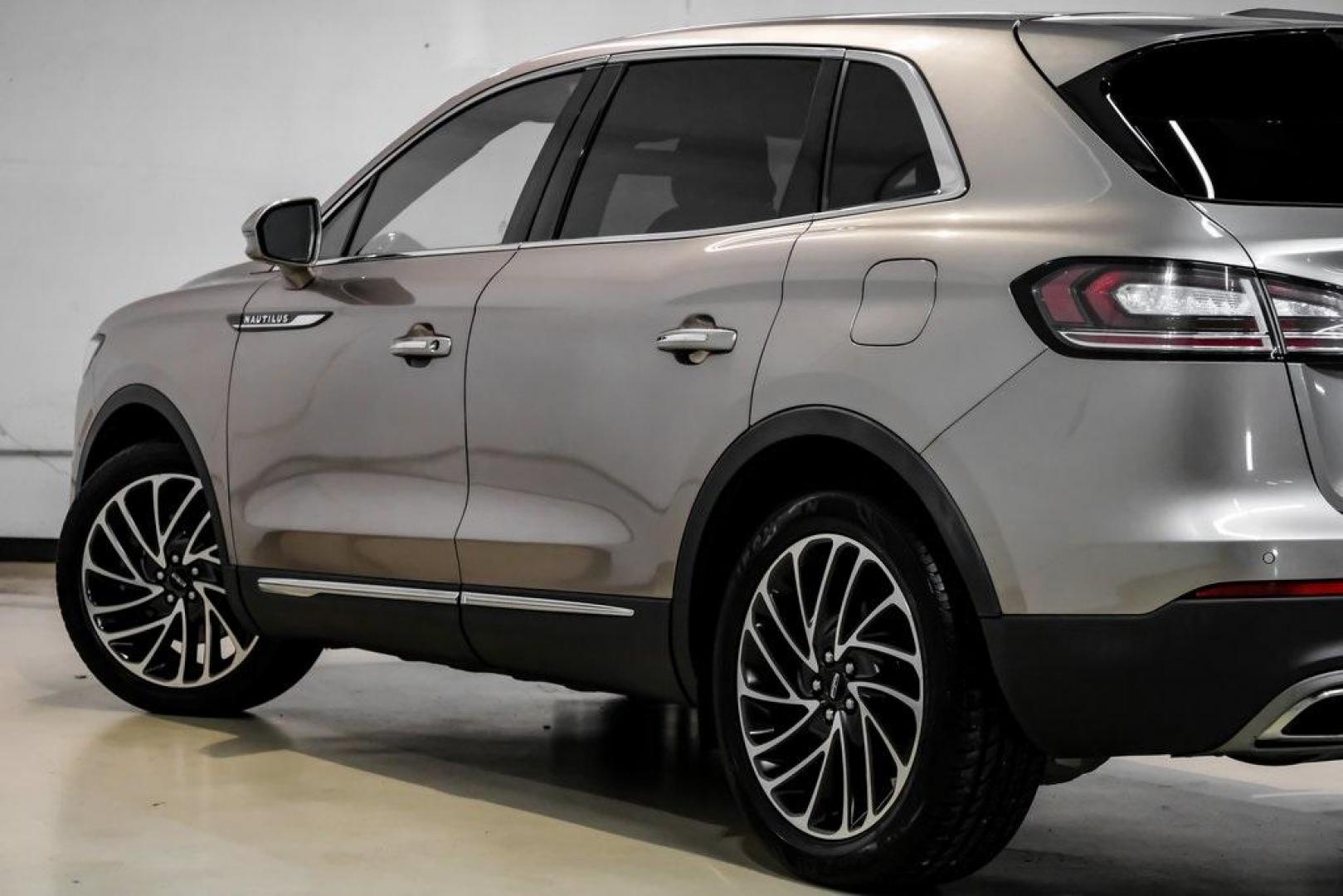 2019 Mocha /Ebony Lincoln Nautilus Reserve (2LMPJ6L98KB) with an 2.0L Turbocharged engine, Automatic transmission, located at 15300 Midway Rd., Addison, TX, 75001, (972) 702-0011, 32.958321, -96.838074 - 2019 Lincoln Nautilus Reserve<br><br>Now Available at Midway Auto Group, Addison, Texas<br><br>Luxurious, powerful, and exceptionally refined the 2019 Lincoln Nautilus Reserve represents the peak of Lincoln's midsize SUV craftsmanship. With its premium interior materials, smooth twin-turbocharged pe - Photo#17