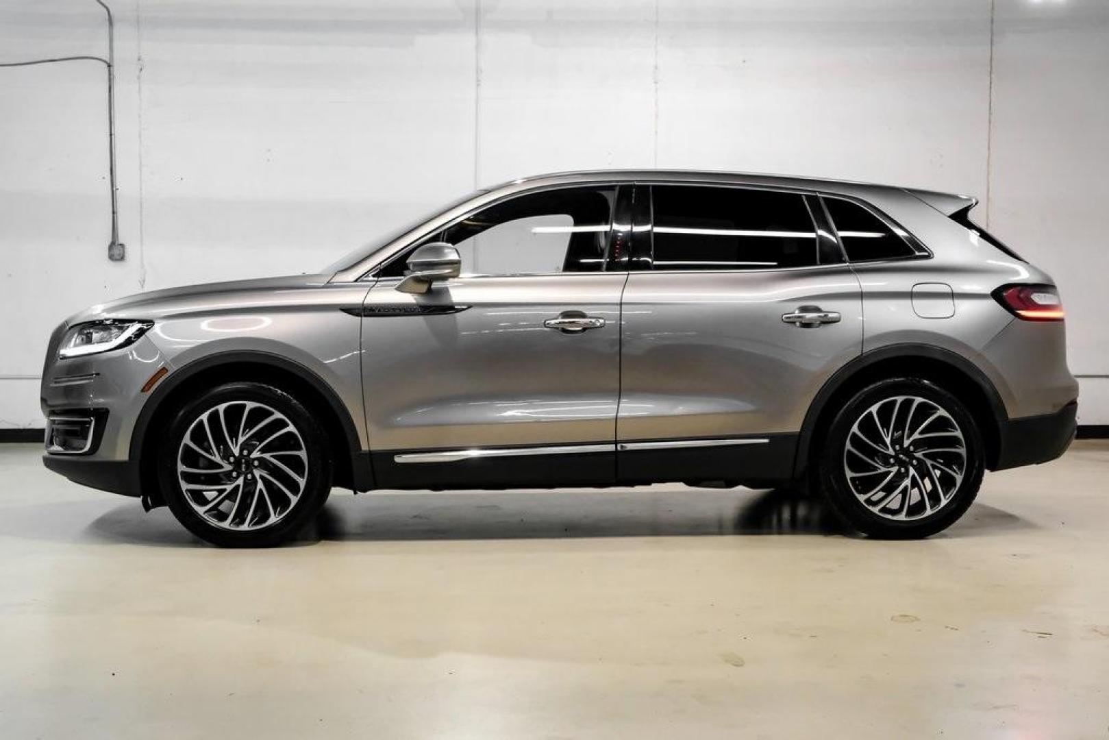 2019 Mocha /Ebony Lincoln Nautilus Reserve (2LMPJ6L98KB) with an 2.0L Turbocharged engine, Automatic transmission, located at 15300 Midway Rd., Addison, TX, 75001, (972) 702-0011, 32.958321, -96.838074 - 2019 Lincoln Nautilus Reserve<br><br>Now Available at Midway Auto Group, Addison, Texas<br><br>Luxurious, powerful, and exceptionally refined the 2019 Lincoln Nautilus Reserve represents the peak of Lincoln's midsize SUV craftsmanship. With its premium interior materials, smooth twin-turbocharged pe - Photo#19