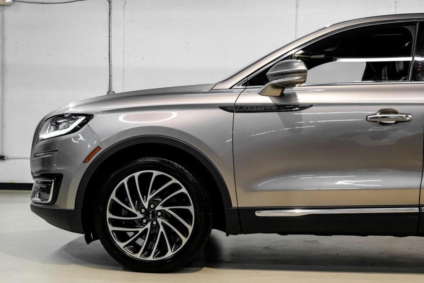 2019 Mocha /Ebony Lincoln Nautilus Reserve (2LMPJ6L98KB) with an 2.0L Turbocharged engine, Automatic transmission, located at 15300 Midway Rd., Addison, TX, 75001, (972) 702-0011, 32.958321, -96.838074 - 2019 Lincoln Nautilus Reserve<br><br>Now Available at Midway Auto Group, Addison, Texas<br><br>Luxurious, powerful, and exceptionally refined the 2019 Lincoln Nautilus Reserve represents the peak of Lincoln's midsize SUV craftsmanship. With its premium interior materials, smooth twin-turbocharged pe - Photo#20