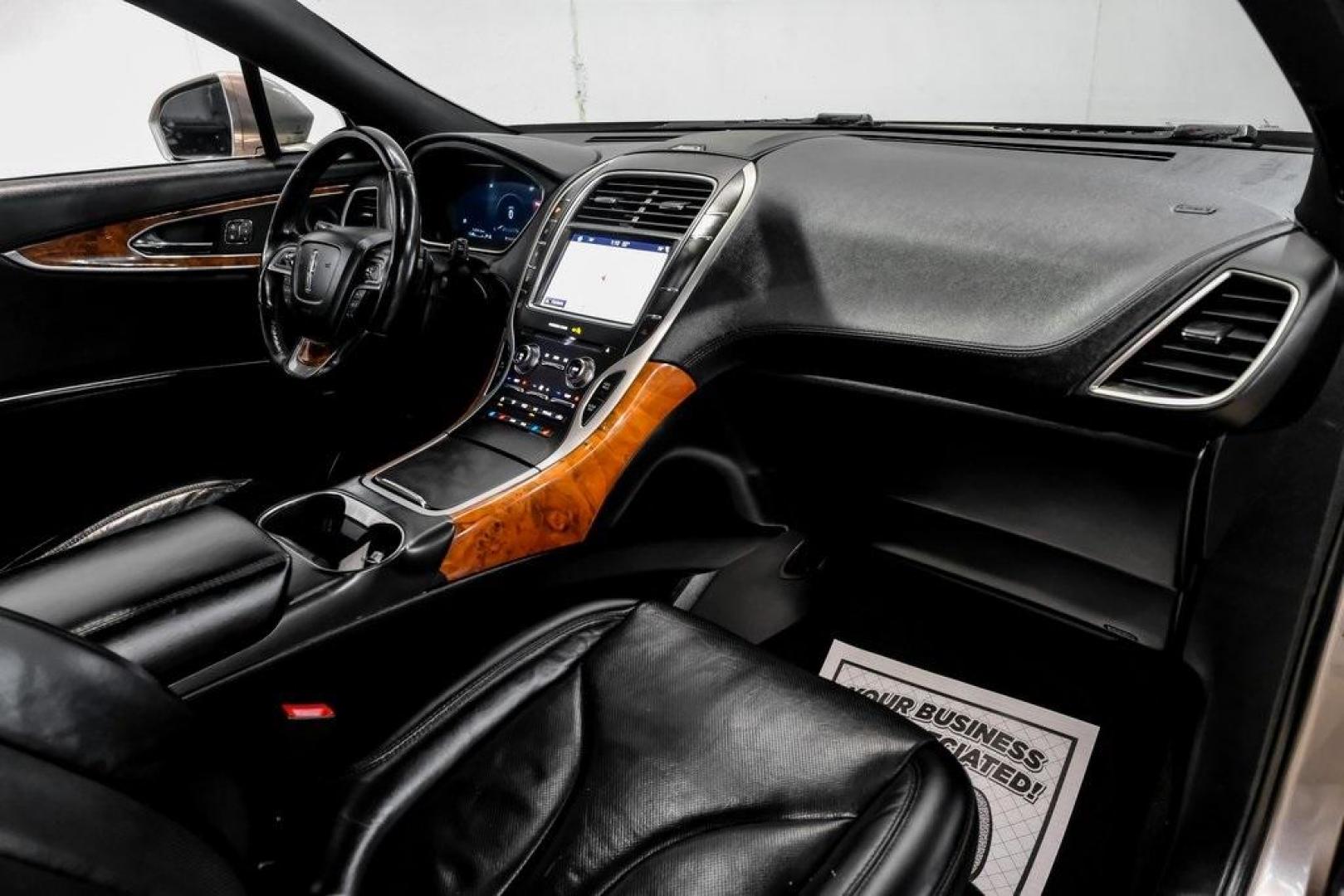 2019 Mocha /Ebony Lincoln Nautilus Reserve (2LMPJ6L98KB) with an 2.0L Turbocharged engine, Automatic transmission, located at 15300 Midway Rd., Addison, TX, 75001, (972) 702-0011, 32.958321, -96.838074 - 2019 Lincoln Nautilus Reserve<br><br>Now Available at Midway Auto Group, Addison, Texas<br><br>Luxurious, powerful, and exceptionally refined the 2019 Lincoln Nautilus Reserve represents the peak of Lincoln's midsize SUV craftsmanship. With its premium interior materials, smooth twin-turbocharged pe - Photo#22