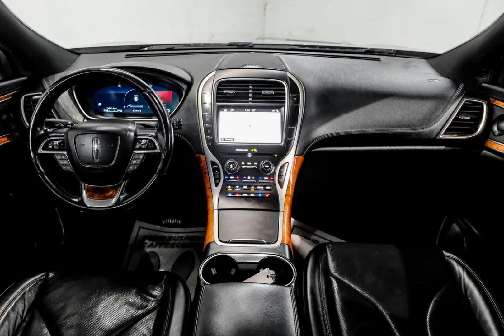 2019 Mocha /Ebony Lincoln Nautilus Reserve (2LMPJ6L98KB) with an 2.0L Turbocharged engine, Automatic transmission, located at 15300 Midway Rd., Addison, TX, 75001, (972) 702-0011, 32.958321, -96.838074 - 2019 Lincoln Nautilus Reserve<br><br>Now Available at Midway Auto Group, Addison, Texas<br><br>Luxurious, powerful, and exceptionally refined the 2019 Lincoln Nautilus Reserve represents the peak of Lincoln's midsize SUV craftsmanship. With its premium interior materials, smooth twin-turbocharged pe - Photo#23