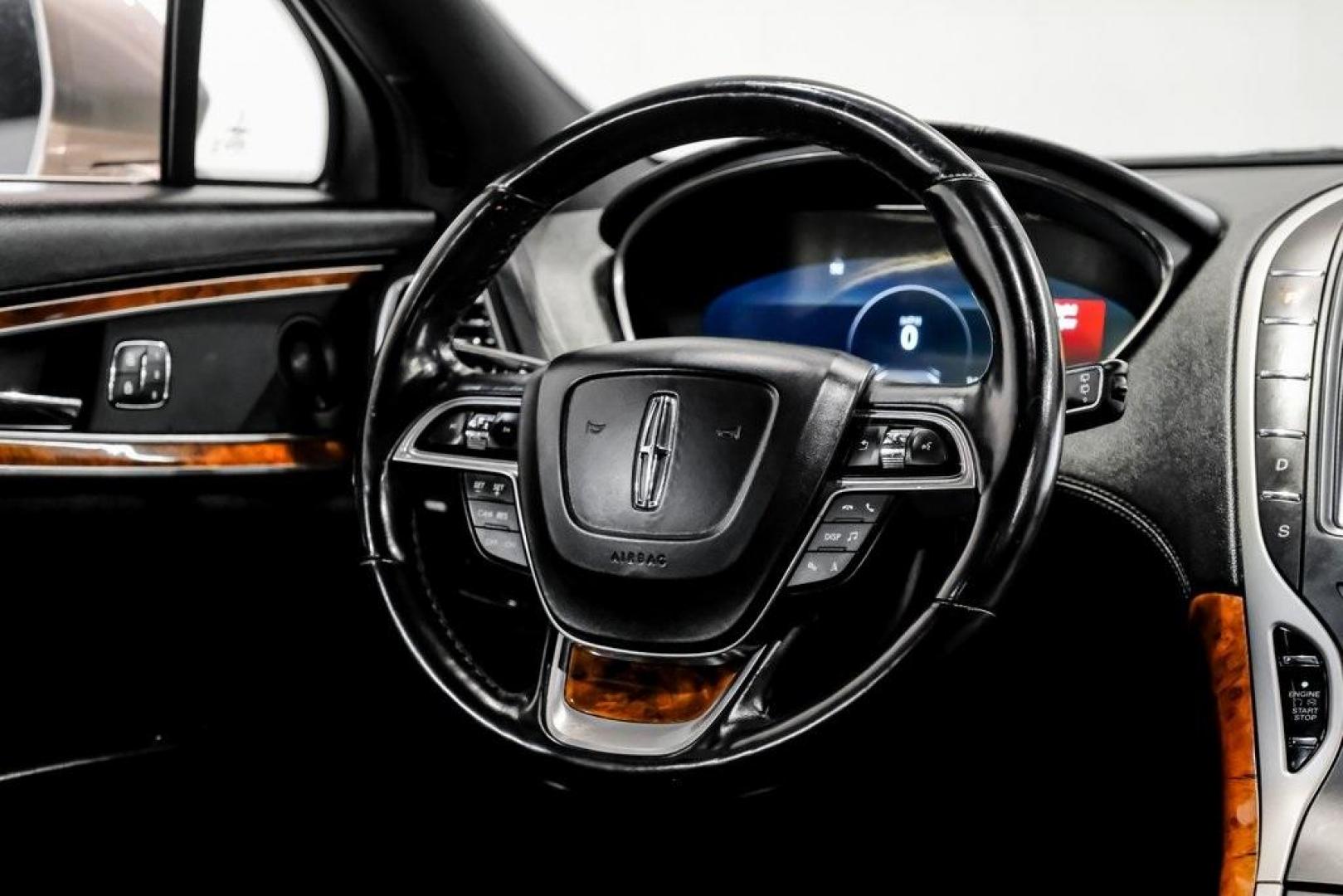 2019 Mocha /Ebony Lincoln Nautilus Reserve (2LMPJ6L98KB) with an 2.0L Turbocharged engine, Automatic transmission, located at 15300 Midway Rd., Addison, TX, 75001, (972) 702-0011, 32.958321, -96.838074 - 2019 Lincoln Nautilus Reserve<br><br>Now Available at Midway Auto Group, Addison, Texas<br><br>Luxurious, powerful, and exceptionally refined the 2019 Lincoln Nautilus Reserve represents the peak of Lincoln's midsize SUV craftsmanship. With its premium interior materials, smooth twin-turbocharged pe - Photo#24