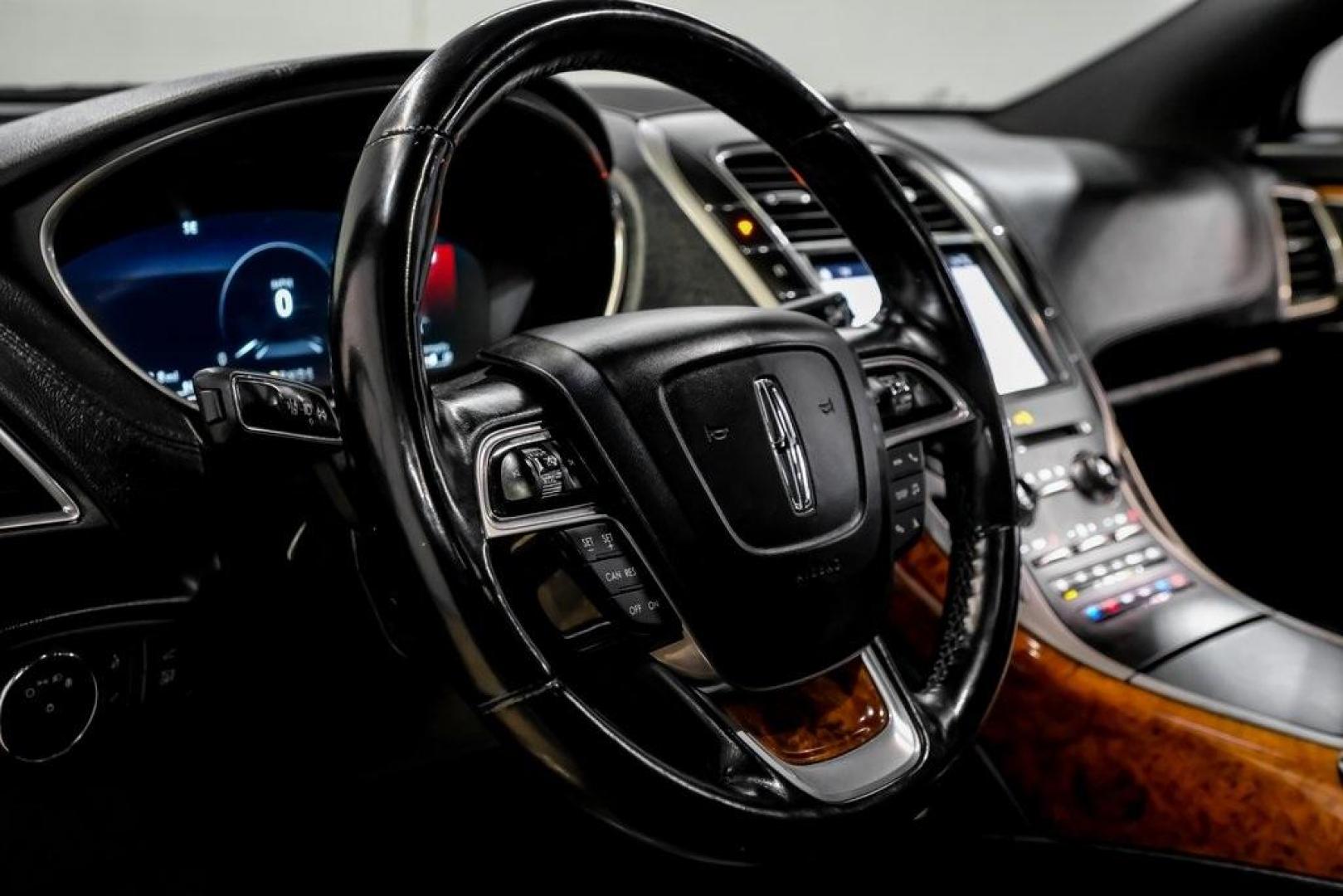 2019 Mocha /Ebony Lincoln Nautilus Reserve (2LMPJ6L98KB) with an 2.0L Turbocharged engine, Automatic transmission, located at 15300 Midway Rd., Addison, TX, 75001, (972) 702-0011, 32.958321, -96.838074 - 2019 Lincoln Nautilus Reserve<br><br>Now Available at Midway Auto Group, Addison, Texas<br><br>Luxurious, powerful, and exceptionally refined the 2019 Lincoln Nautilus Reserve represents the peak of Lincoln's midsize SUV craftsmanship. With its premium interior materials, smooth twin-turbocharged pe - Photo#25