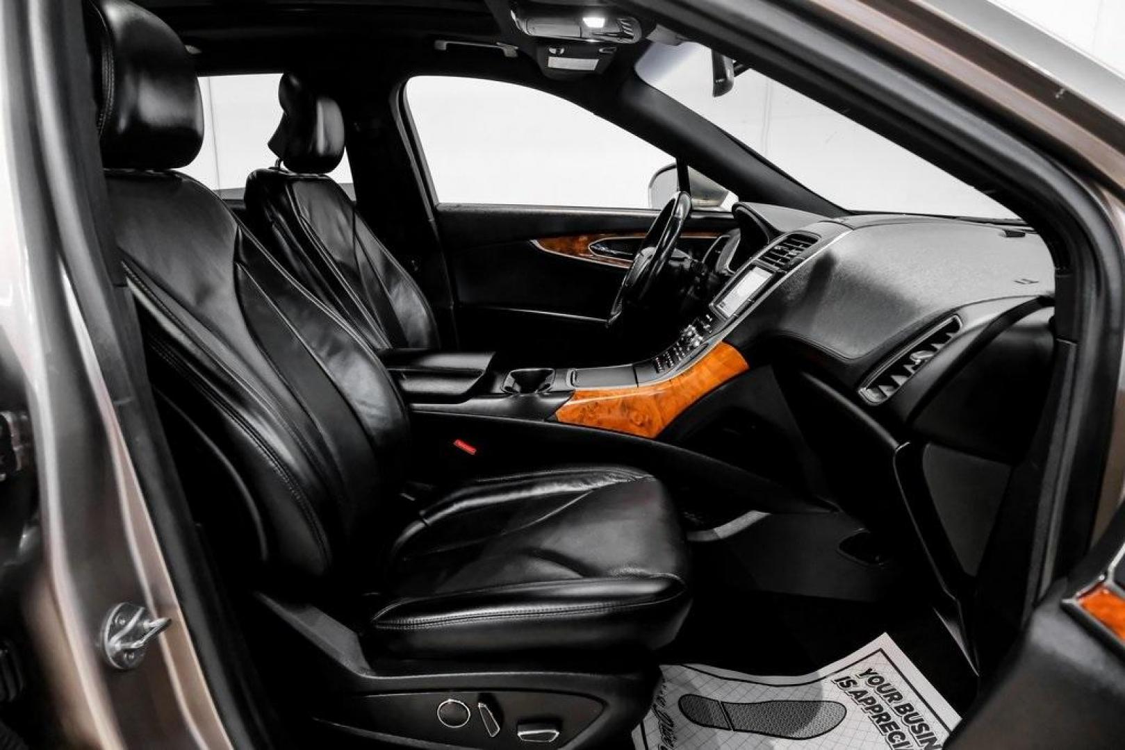 2019 Mocha /Ebony Lincoln Nautilus Reserve (2LMPJ6L98KB) with an 2.0L Turbocharged engine, Automatic transmission, located at 15300 Midway Rd., Addison, TX, 75001, (972) 702-0011, 32.958321, -96.838074 - 2019 Lincoln Nautilus Reserve<br><br>Now Available at Midway Auto Group, Addison, Texas<br><br>Luxurious, powerful, and exceptionally refined the 2019 Lincoln Nautilus Reserve represents the peak of Lincoln's midsize SUV craftsmanship. With its premium interior materials, smooth twin-turbocharged pe - Photo#46