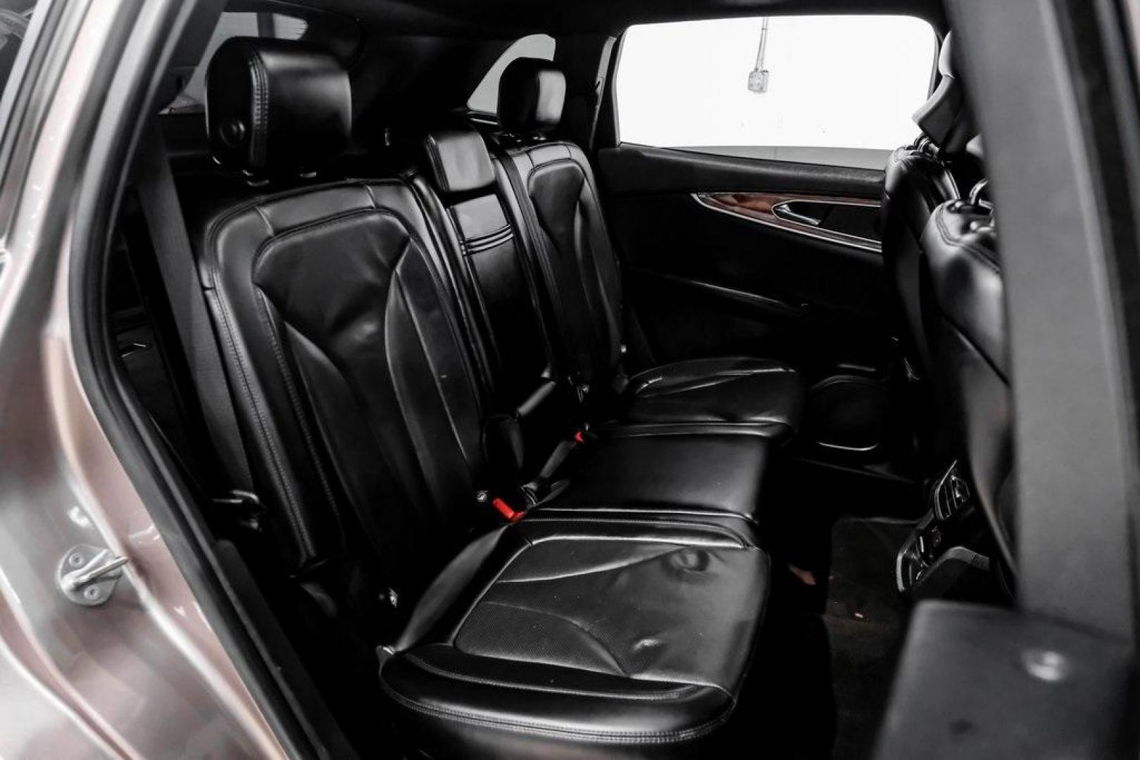 2019 Mocha /Ebony Lincoln Nautilus Reserve (2LMPJ6L98KB) with an 2.0L Turbocharged engine, Automatic transmission, located at 15300 Midway Rd., Addison, TX, 75001, (972) 702-0011, 32.958321, -96.838074 - 2019 Lincoln Nautilus Reserve<br><br>Now Available at Midway Auto Group, Addison, Texas<br><br>Luxurious, powerful, and exceptionally refined the 2019 Lincoln Nautilus Reserve represents the peak of Lincoln's midsize SUV craftsmanship. With its premium interior materials, smooth twin-turbocharged pe - Photo#49