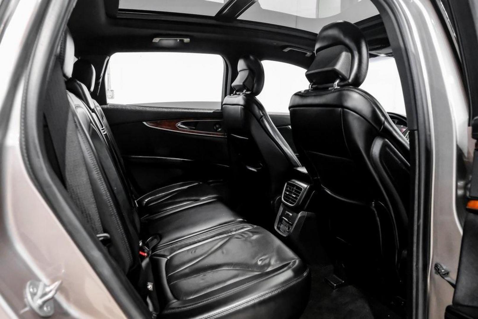 2019 Mocha /Ebony Lincoln Nautilus Reserve (2LMPJ6L98KB) with an 2.0L Turbocharged engine, Automatic transmission, located at 15300 Midway Rd., Addison, TX, 75001, (972) 702-0011, 32.958321, -96.838074 - 2019 Lincoln Nautilus Reserve<br><br>Now Available at Midway Auto Group, Addison, Texas<br><br>Luxurious, powerful, and exceptionally refined the 2019 Lincoln Nautilus Reserve represents the peak of Lincoln's midsize SUV craftsmanship. With its premium interior materials, smooth twin-turbocharged pe - Photo#50