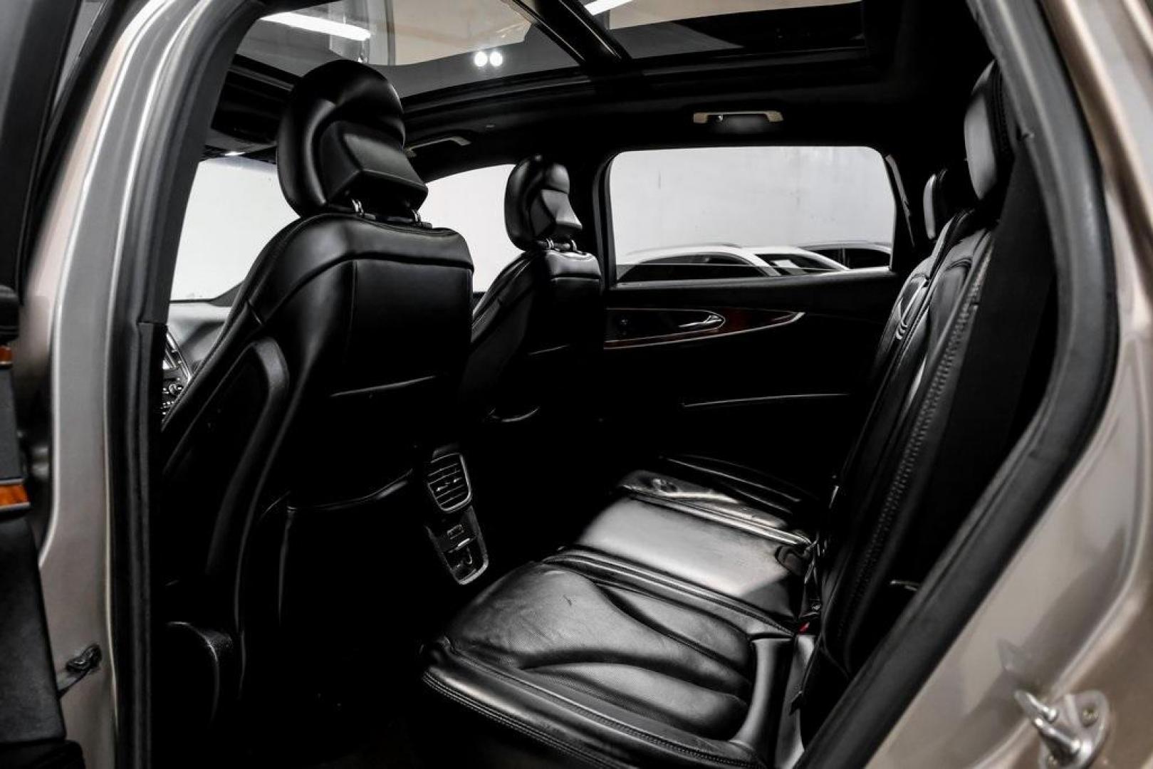 2019 Mocha /Ebony Lincoln Nautilus Reserve (2LMPJ6L98KB) with an 2.0L Turbocharged engine, Automatic transmission, located at 15300 Midway Rd., Addison, TX, 75001, (972) 702-0011, 32.958321, -96.838074 - 2019 Lincoln Nautilus Reserve<br><br>Now Available at Midway Auto Group, Addison, Texas<br><br>Luxurious, powerful, and exceptionally refined the 2019 Lincoln Nautilus Reserve represents the peak of Lincoln's midsize SUV craftsmanship. With its premium interior materials, smooth twin-turbocharged pe - Photo#51