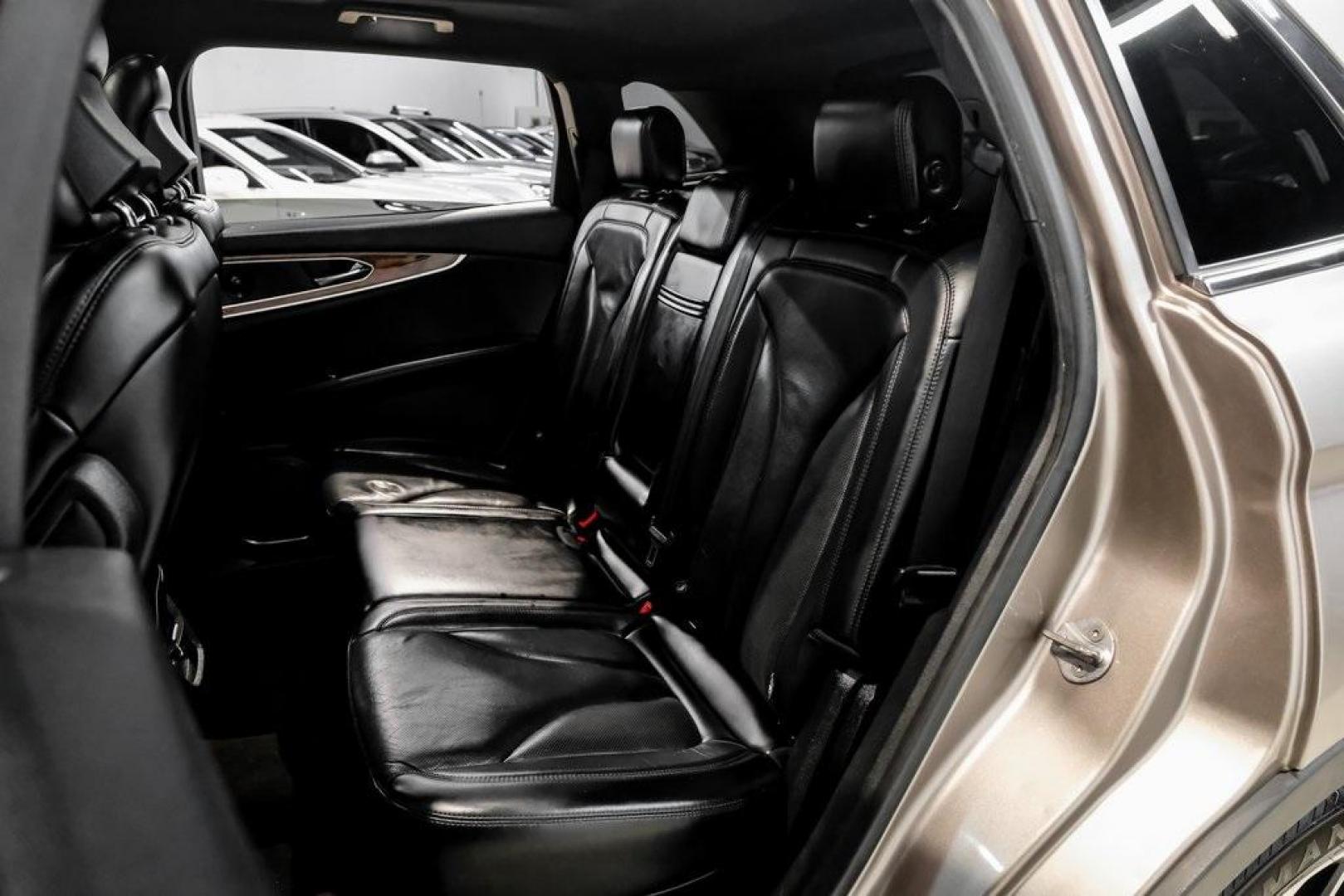 2019 Mocha /Ebony Lincoln Nautilus Reserve (2LMPJ6L98KB) with an 2.0L Turbocharged engine, Automatic transmission, located at 15300 Midway Rd., Addison, TX, 75001, (972) 702-0011, 32.958321, -96.838074 - 2019 Lincoln Nautilus Reserve<br><br>Now Available at Midway Auto Group, Addison, Texas<br><br>Luxurious, powerful, and exceptionally refined the 2019 Lincoln Nautilus Reserve represents the peak of Lincoln's midsize SUV craftsmanship. With its premium interior materials, smooth twin-turbocharged pe - Photo#52