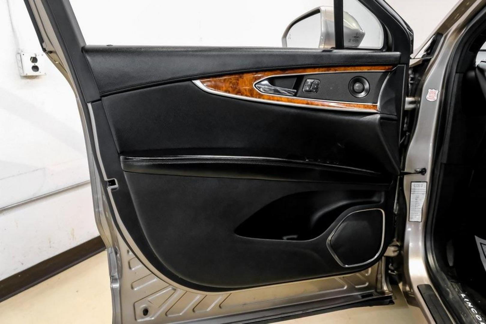 2019 Mocha /Ebony Lincoln Nautilus Reserve (2LMPJ6L98KB) with an 2.0L Turbocharged engine, Automatic transmission, located at 15300 Midway Rd., Addison, TX, 75001, (972) 702-0011, 32.958321, -96.838074 - 2019 Lincoln Nautilus Reserve<br><br>Now Available at Midway Auto Group, Addison, Texas<br><br>Luxurious, powerful, and exceptionally refined the 2019 Lincoln Nautilus Reserve represents the peak of Lincoln's midsize SUV craftsmanship. With its premium interior materials, smooth twin-turbocharged pe - Photo#56