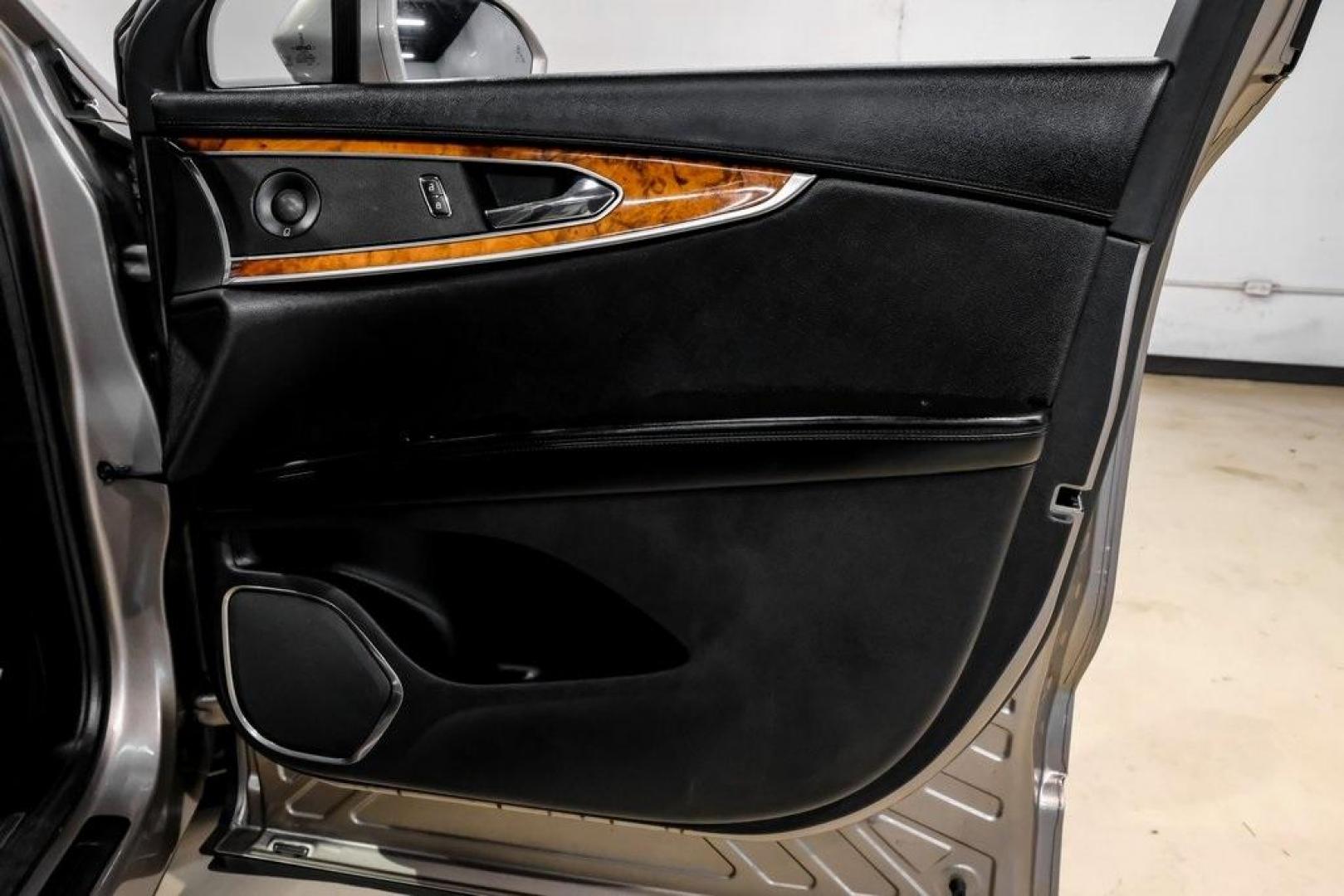 2019 Mocha /Ebony Lincoln Nautilus Reserve (2LMPJ6L98KB) with an 2.0L Turbocharged engine, Automatic transmission, located at 15300 Midway Rd., Addison, TX, 75001, (972) 702-0011, 32.958321, -96.838074 - 2019 Lincoln Nautilus Reserve<br><br>Now Available at Midway Auto Group, Addison, Texas<br><br>Luxurious, powerful, and exceptionally refined the 2019 Lincoln Nautilus Reserve represents the peak of Lincoln's midsize SUV craftsmanship. With its premium interior materials, smooth twin-turbocharged pe - Photo#58