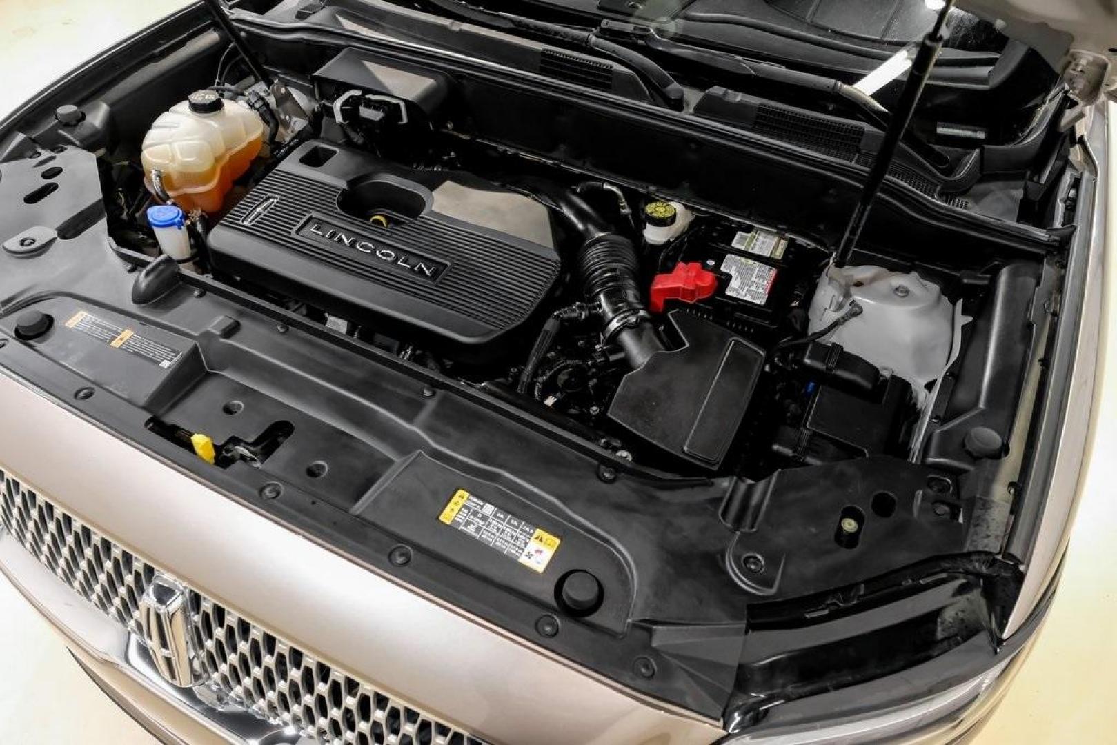 2019 Mocha /Ebony Lincoln Nautilus Reserve (2LMPJ6L98KB) with an 2.0L Turbocharged engine, Automatic transmission, located at 15300 Midway Rd., Addison, TX, 75001, (972) 702-0011, 32.958321, -96.838074 - 2019 Lincoln Nautilus Reserve<br><br>Now Available at Midway Auto Group, Addison, Texas<br><br>Luxurious, powerful, and exceptionally refined the 2019 Lincoln Nautilus Reserve represents the peak of Lincoln's midsize SUV craftsmanship. With its premium interior materials, smooth twin-turbocharged pe - Photo#63