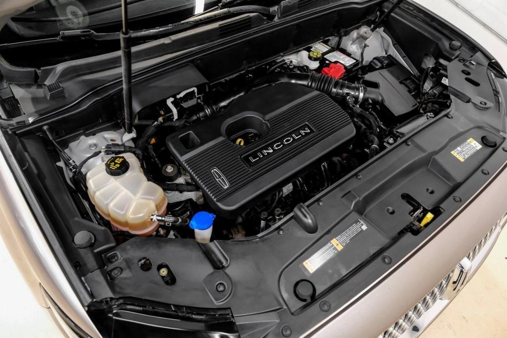 2019 Mocha /Ebony Lincoln Nautilus Reserve (2LMPJ6L98KB) with an 2.0L Turbocharged engine, Automatic transmission, located at 15300 Midway Rd., Addison, TX, 75001, (972) 702-0011, 32.958321, -96.838074 - 2019 Lincoln Nautilus Reserve<br><br>Now Available at Midway Auto Group, Addison, Texas<br><br>Luxurious, powerful, and exceptionally refined the 2019 Lincoln Nautilus Reserve represents the peak of Lincoln's midsize SUV craftsmanship. With its premium interior materials, smooth twin-turbocharged pe - Photo#65