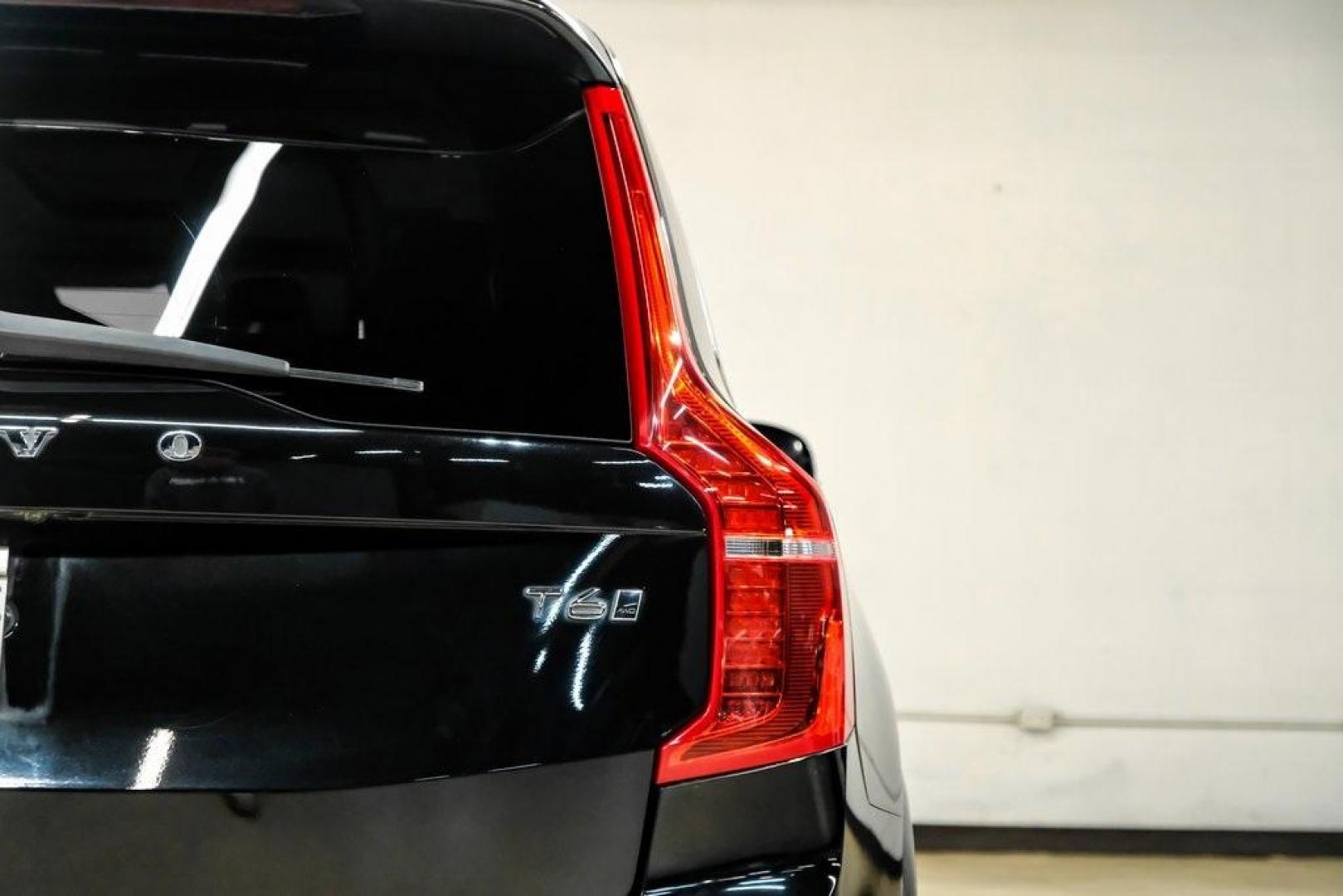 2017 Onyx Black Metallic /Charcoal Volvo XC90 T6 Momentum (YV4A22PK7H1) with an I4 Supercharged engine, Automatic transmission, located at 15300 Midway Rd., Addison, TX, 75001, (972) 702-0011, 32.958321, -96.838074 - 2017 Volvo XC90 T6 Momentum AWD<br><br>Now Available at Midway Auto Group, Addison, Texas<br><br>Elegant, safe, and exceptionally refined, the 2017 Volvo XC90 T6 Momentum AWD combines Scandinavian luxury with advanced engineering and award-winning safety. With its premium interior, powerful twin-cha - Photo#53