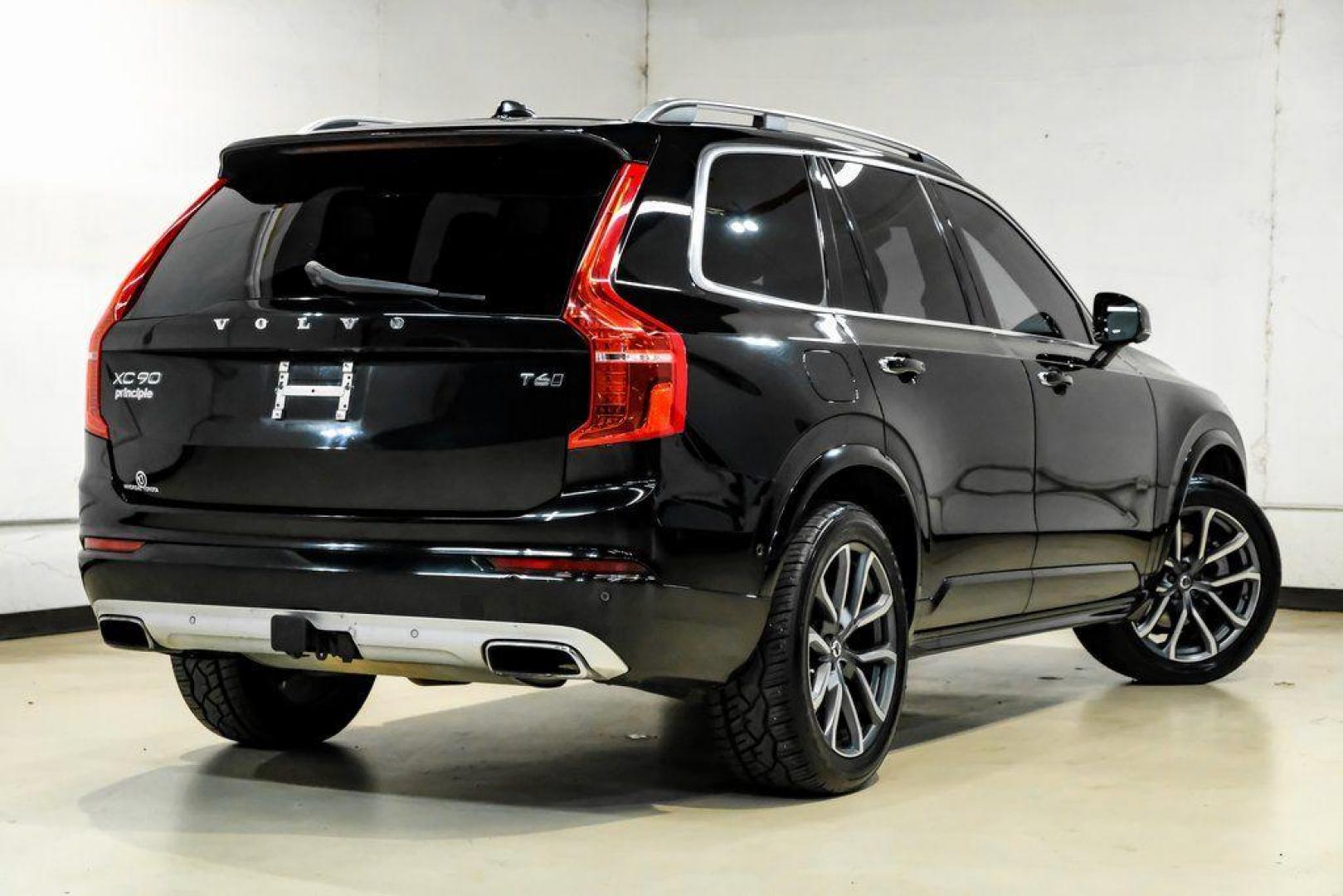 2017 Onyx Black Metallic /Charcoal Volvo XC90 T6 Momentum (YV4A22PK7H1) with an I4 Supercharged engine, Automatic transmission, located at 15300 Midway Rd., Addison, TX, 75001, (972) 702-0011, 32.958321, -96.838074 - 2017 Volvo XC90 T6 Momentum AWD<br><br>Now Available at Midway Auto Group, Addison, Texas<br><br>Elegant, safe, and exceptionally refined, the 2017 Volvo XC90 T6 Momentum AWD combines Scandinavian luxury with advanced engineering and award-winning safety. With its premium interior, powerful twin-cha - Photo#8