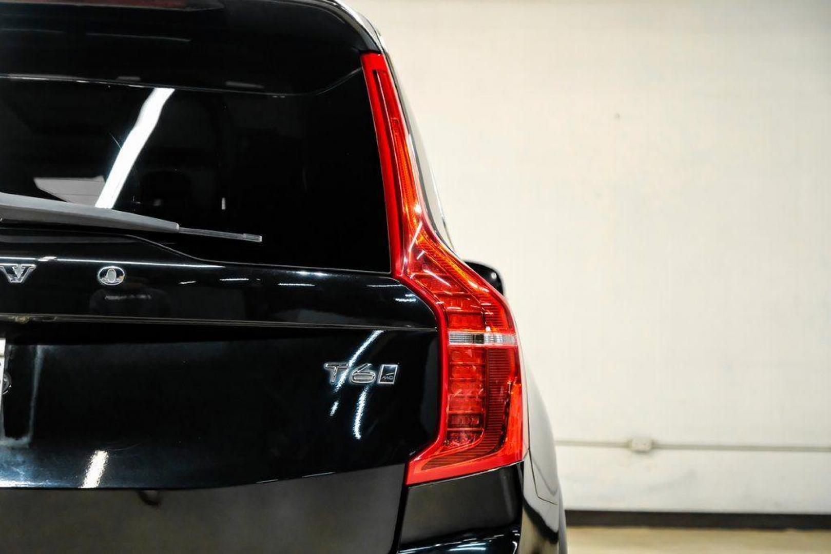 2017 Onyx Black Metallic /Charcoal Volvo XC90 T6 Momentum (YV4A22PK7H1) with an I4 Supercharged engine, Automatic transmission, located at 15300 Midway Rd., Addison, TX, 75001, (972) 702-0011, 32.958321, -96.838074 - 2017 Volvo XC90 T6 Momentum AWD<br><br>Now Available at Midway Auto Group, Addison, Texas<br><br>Elegant, safe, and exceptionally refined, the 2017 Volvo XC90 T6 Momentum AWD combines Scandinavian luxury with advanced engineering and award-winning safety. With its premium interior, powerful twin-cha - Photo#53