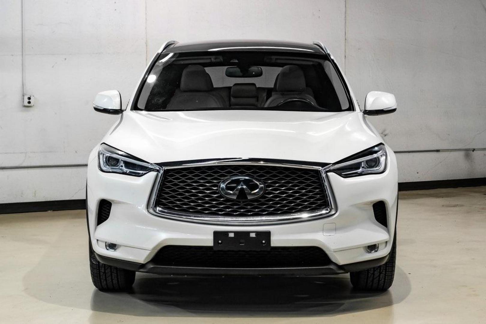 2021 Majestic White /Wheat INFINITI QX50 LUXE (3PCAJ5BA5MF) with an I4 engine, CVT transmission, located at 15300 Midway Rd., Addison, TX, 75001, (972) 702-0011, 32.958321, -96.838074 - Photo#5