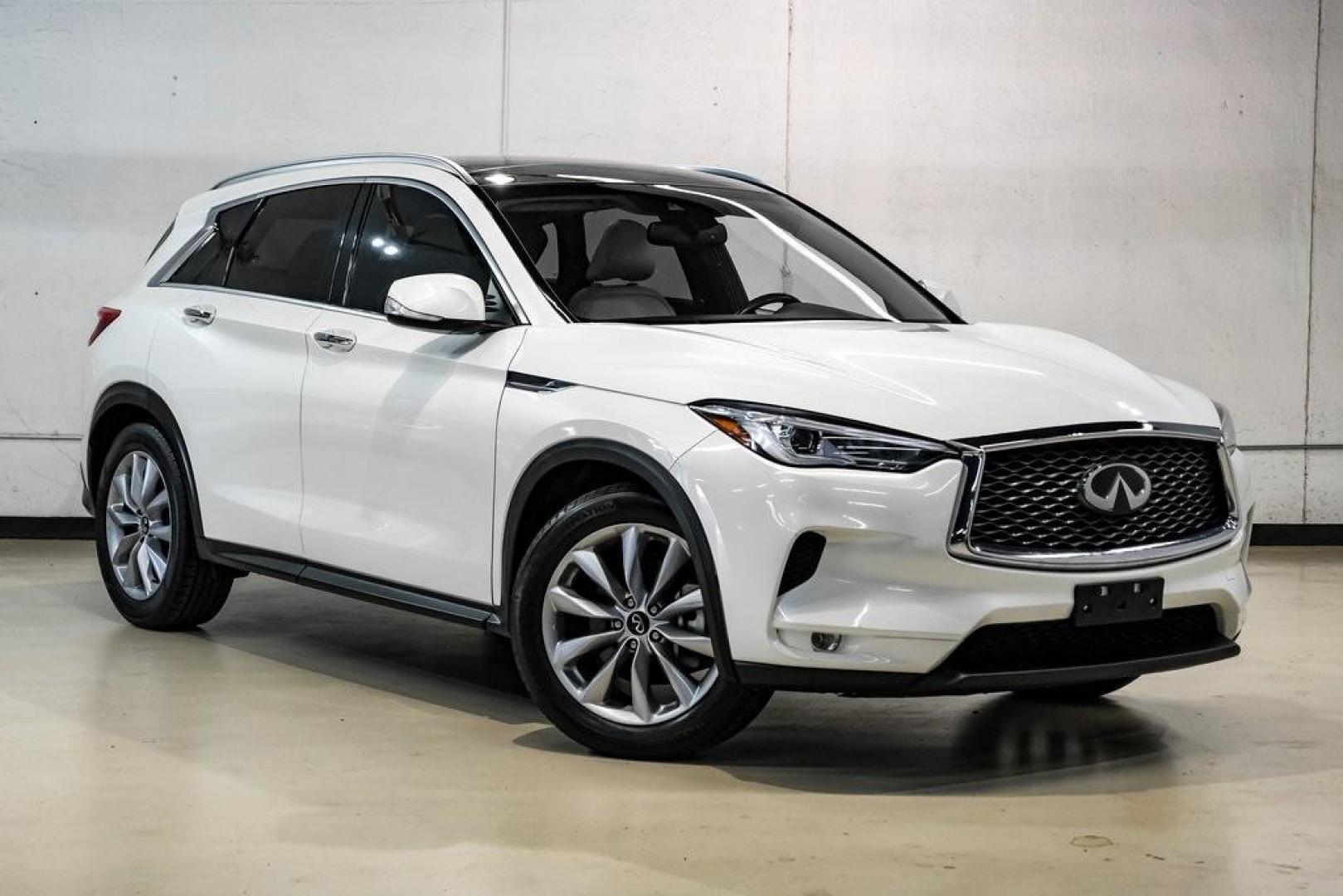 2021 Majestic White /Wheat INFINITI QX50 LUXE (3PCAJ5BA5MF) with an I4 engine, CVT transmission, located at 15300 Midway Rd., Addison, TX, 75001, (972) 702-0011, 32.958321, -96.838074 - Photo#6