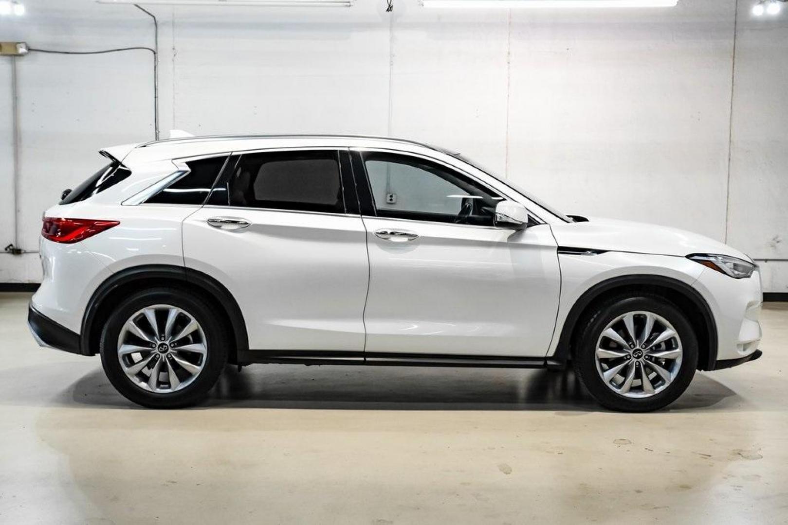 2021 Majestic White /Wheat INFINITI QX50 LUXE (3PCAJ5BA5MF) with an I4 engine, CVT transmission, located at 15300 Midway Rd., Addison, TX, 75001, (972) 702-0011, 32.958321, -96.838074 - Photo#7