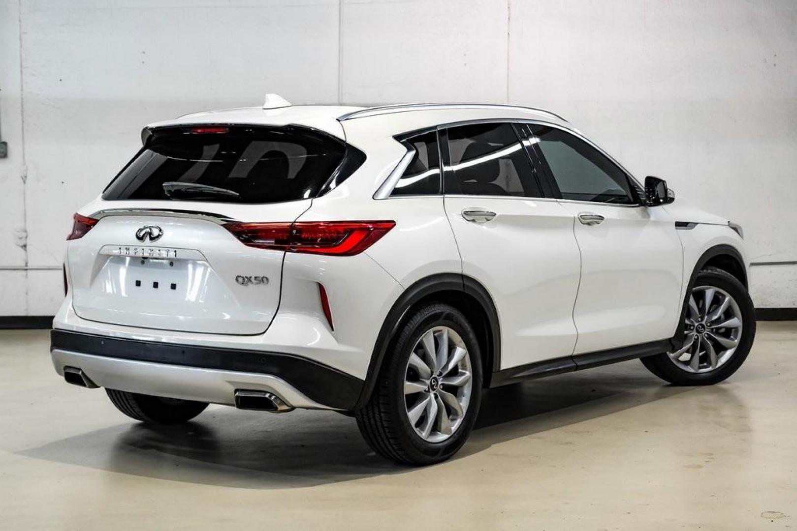2021 Majestic White /Wheat INFINITI QX50 LUXE (3PCAJ5BA5MF) with an I4 engine, CVT transmission, located at 15300 Midway Rd., Addison, TX, 75001, (972) 702-0011, 32.958321, -96.838074 - Photo#8