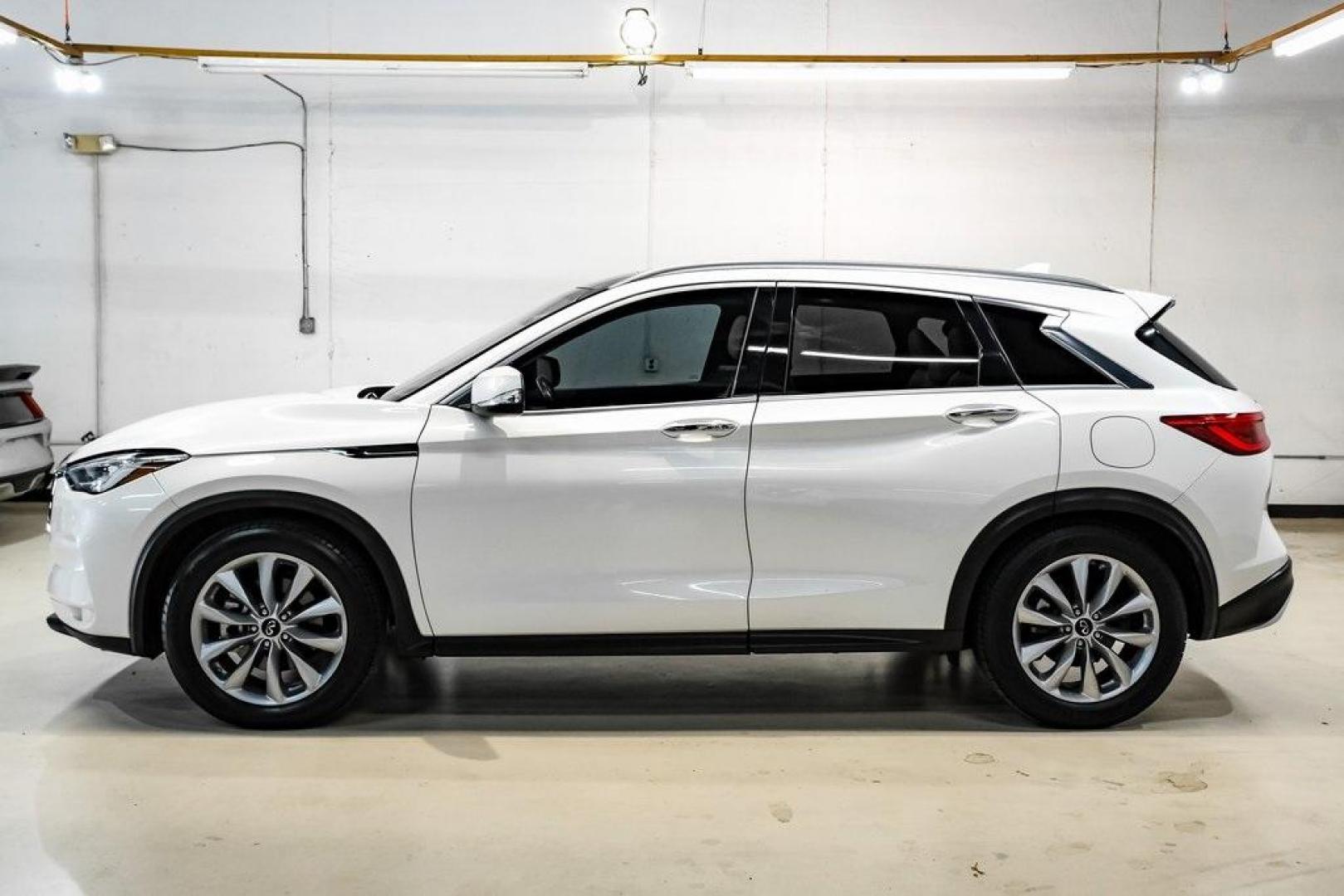 2021 Majestic White /Wheat INFINITI QX50 LUXE (3PCAJ5BA5MF) with an I4 engine, CVT transmission, located at 15300 Midway Rd., Addison, TX, 75001, (972) 702-0011, 32.958321, -96.838074 - Photo#11