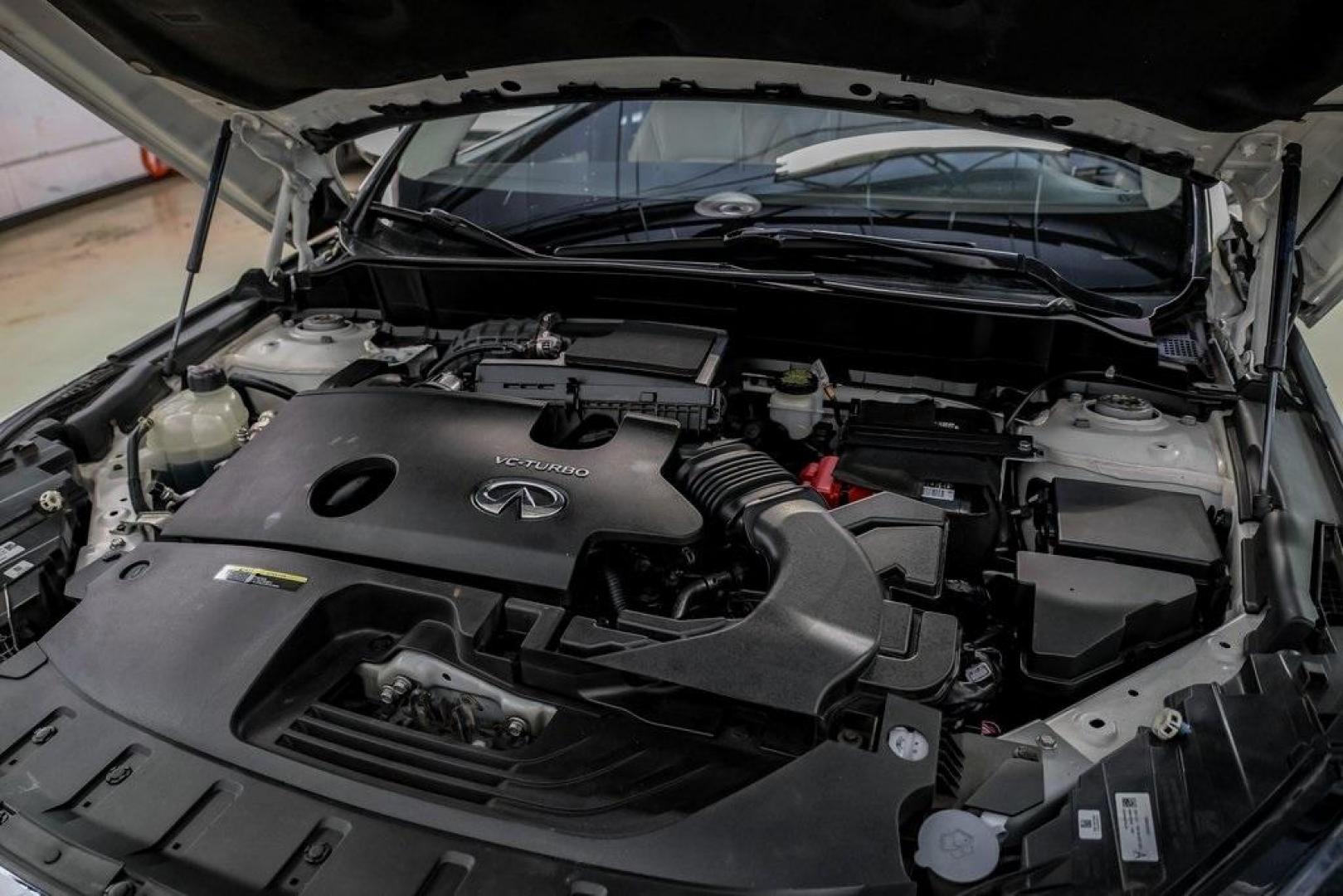 2021 Majestic White /Wheat INFINITI QX50 LUXE (3PCAJ5BA5MF) with an I4 engine, CVT transmission, located at 15300 Midway Rd., Addison, TX, 75001, (972) 702-0011, 32.958321, -96.838074 - Photo#49