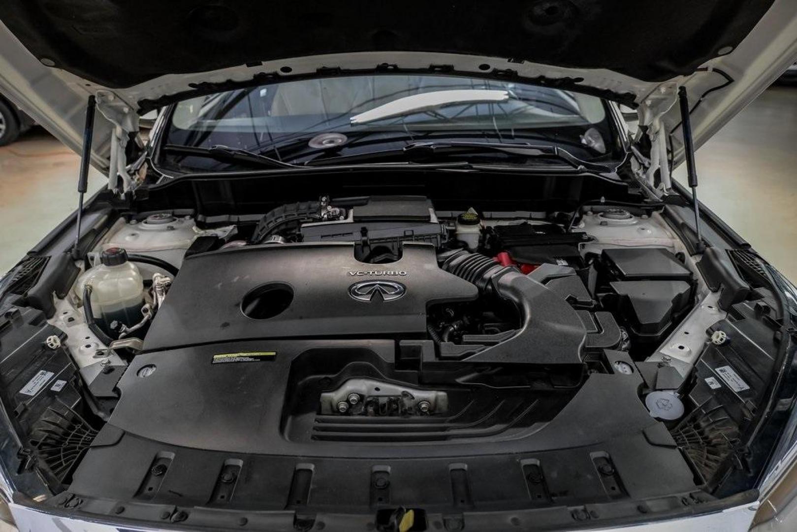 2021 Majestic White /Wheat INFINITI QX50 LUXE (3PCAJ5BA5MF) with an I4 engine, CVT transmission, located at 15300 Midway Rd., Addison, TX, 75001, (972) 702-0011, 32.958321, -96.838074 - Photo#50