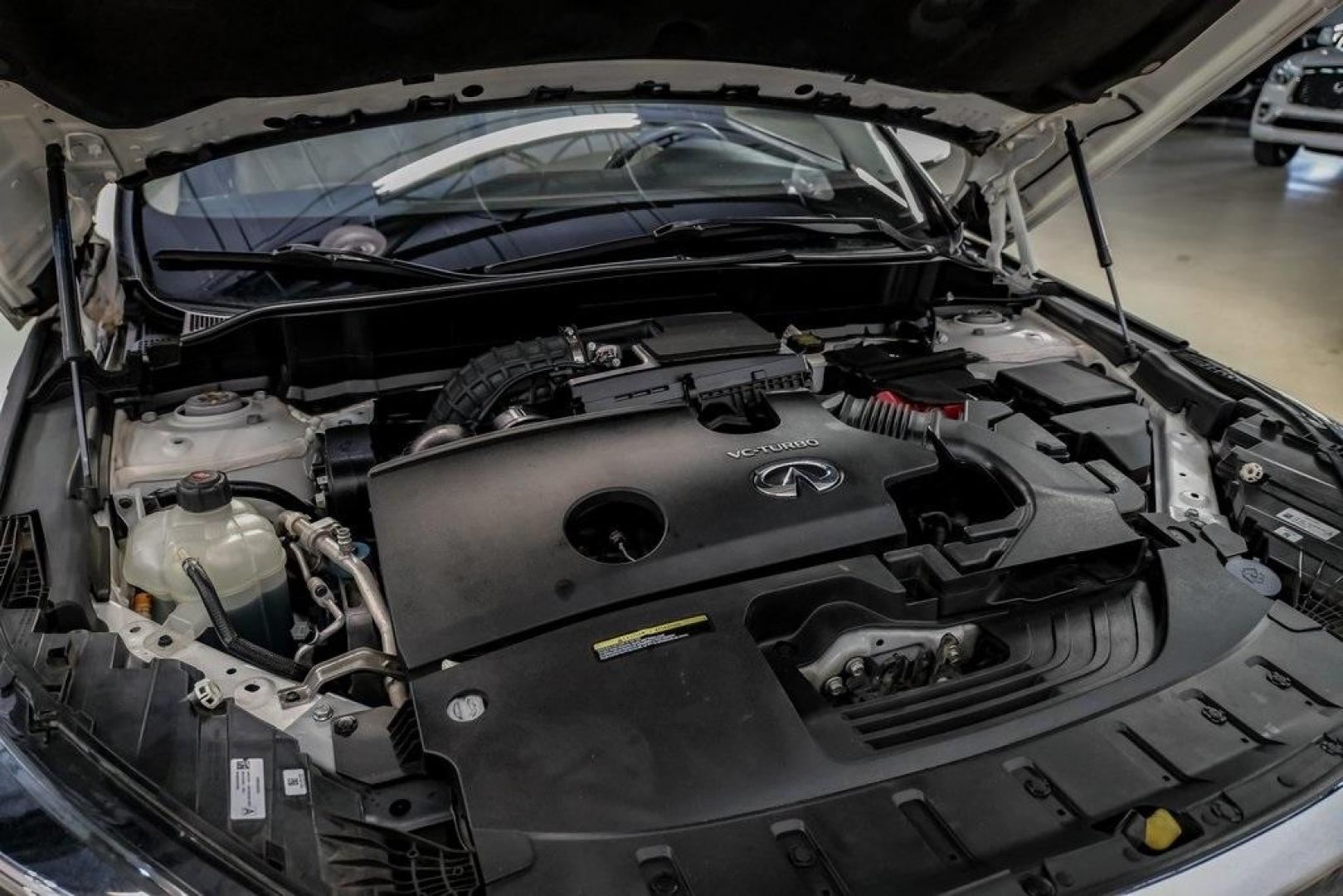 2021 Majestic White /Wheat INFINITI QX50 LUXE (3PCAJ5BA5MF) with an I4 engine, CVT transmission, located at 15300 Midway Rd., Addison, TX, 75001, (972) 702-0011, 32.958321, -96.838074 - Photo#51