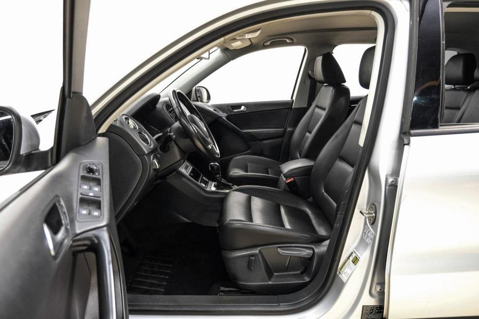 2016 Reflex Silver Metallic Volkswagen Tiguan S (WVGAV7AX0GW) with an 2.0L 4-Cylinder Turbocharged engine, Automatic transmission, located at 15300 Midway Rd., Addison, TX, 75001, (972) 702-0011, 32.958321, -96.838074 - Photo#3