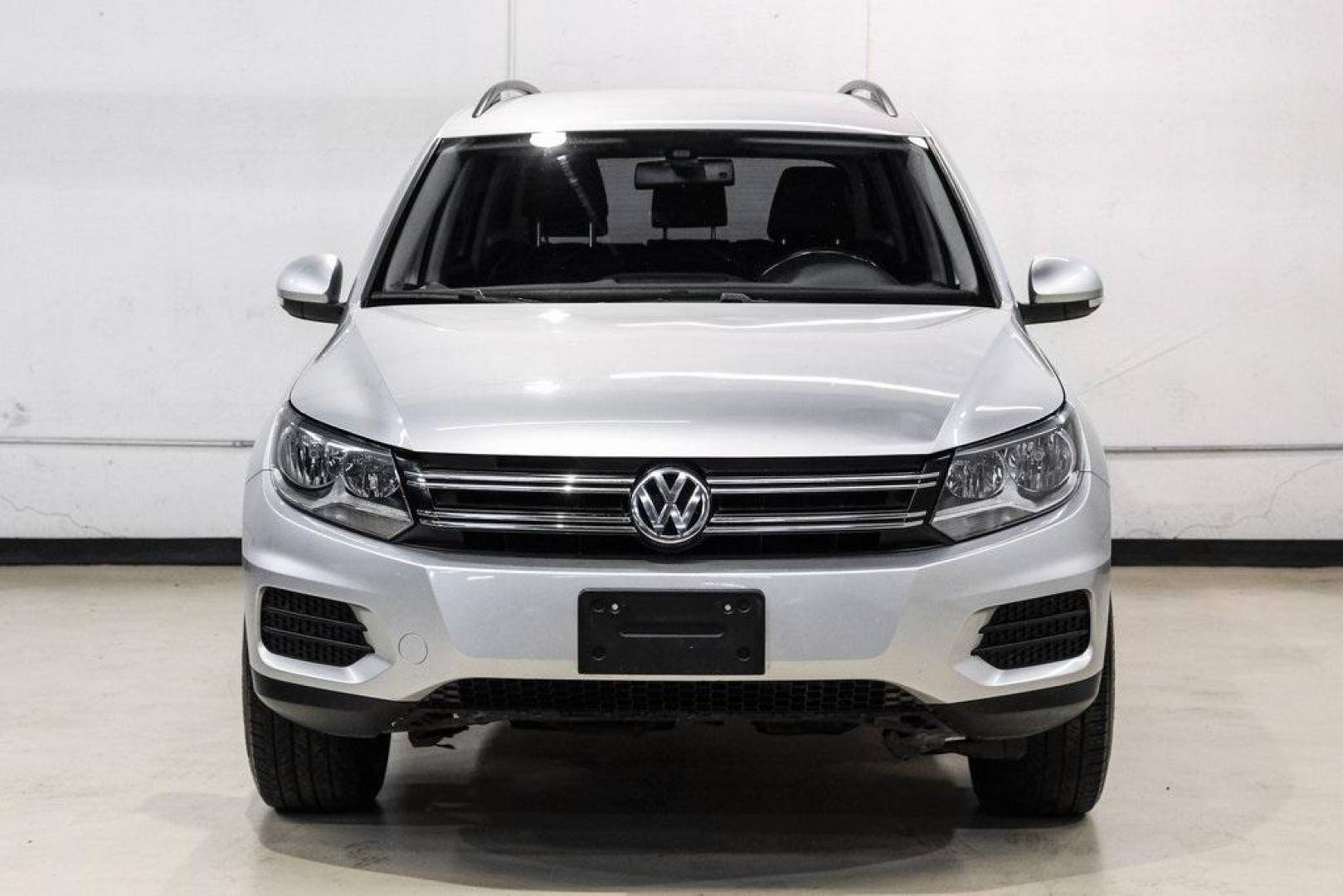 2016 Reflex Silver Metallic Volkswagen Tiguan S (WVGAV7AX0GW) with an 2.0L 4-Cylinder Turbocharged engine, Automatic transmission, located at 15300 Midway Rd., Addison, TX, 75001, (972) 702-0011, 32.958321, -96.838074 - Photo#6