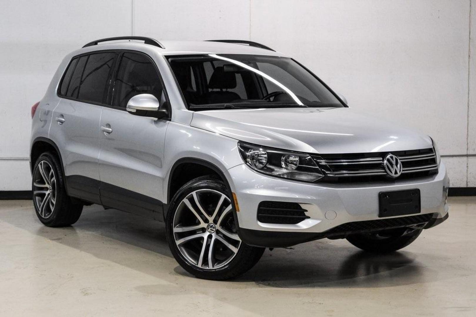 2016 Reflex Silver Metallic Volkswagen Tiguan S (WVGAV7AX0GW) with an 2.0L 4-Cylinder Turbocharged engine, Automatic transmission, located at 15300 Midway Rd., Addison, TX, 75001, (972) 702-0011, 32.958321, -96.838074 - Photo#7