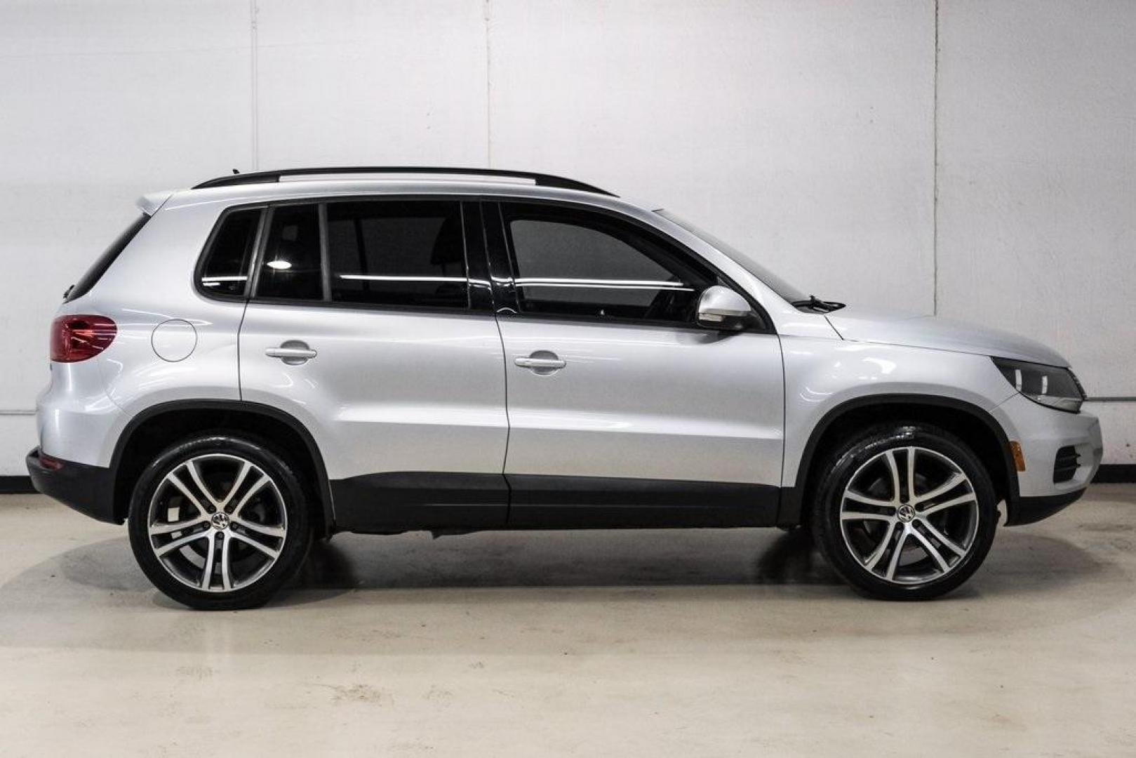 2016 Reflex Silver Metallic Volkswagen Tiguan S (WVGAV7AX0GW) with an 2.0L 4-Cylinder Turbocharged engine, Automatic transmission, located at 15300 Midway Rd., Addison, TX, 75001, (972) 702-0011, 32.958321, -96.838074 - Photo#8