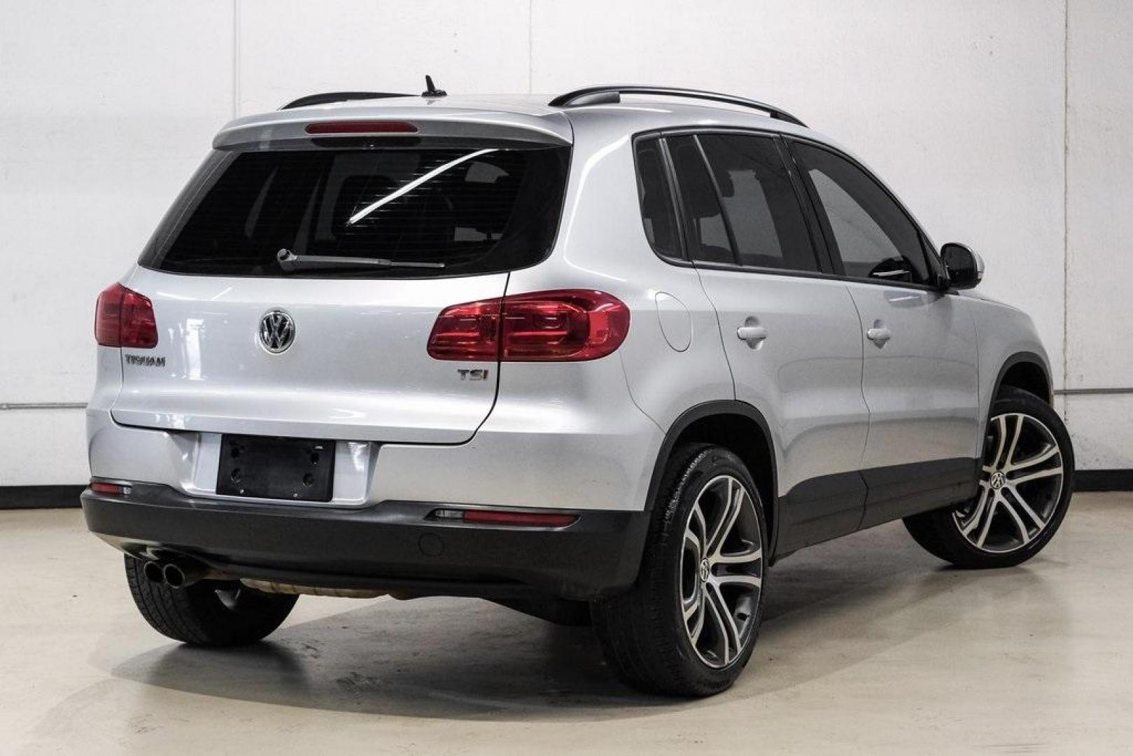 2016 Reflex Silver Metallic Volkswagen Tiguan S (WVGAV7AX0GW) with an 2.0L 4-Cylinder Turbocharged engine, Automatic transmission, located at 15300 Midway Rd., Addison, TX, 75001, (972) 702-0011, 32.958321, -96.838074 - Photo#9