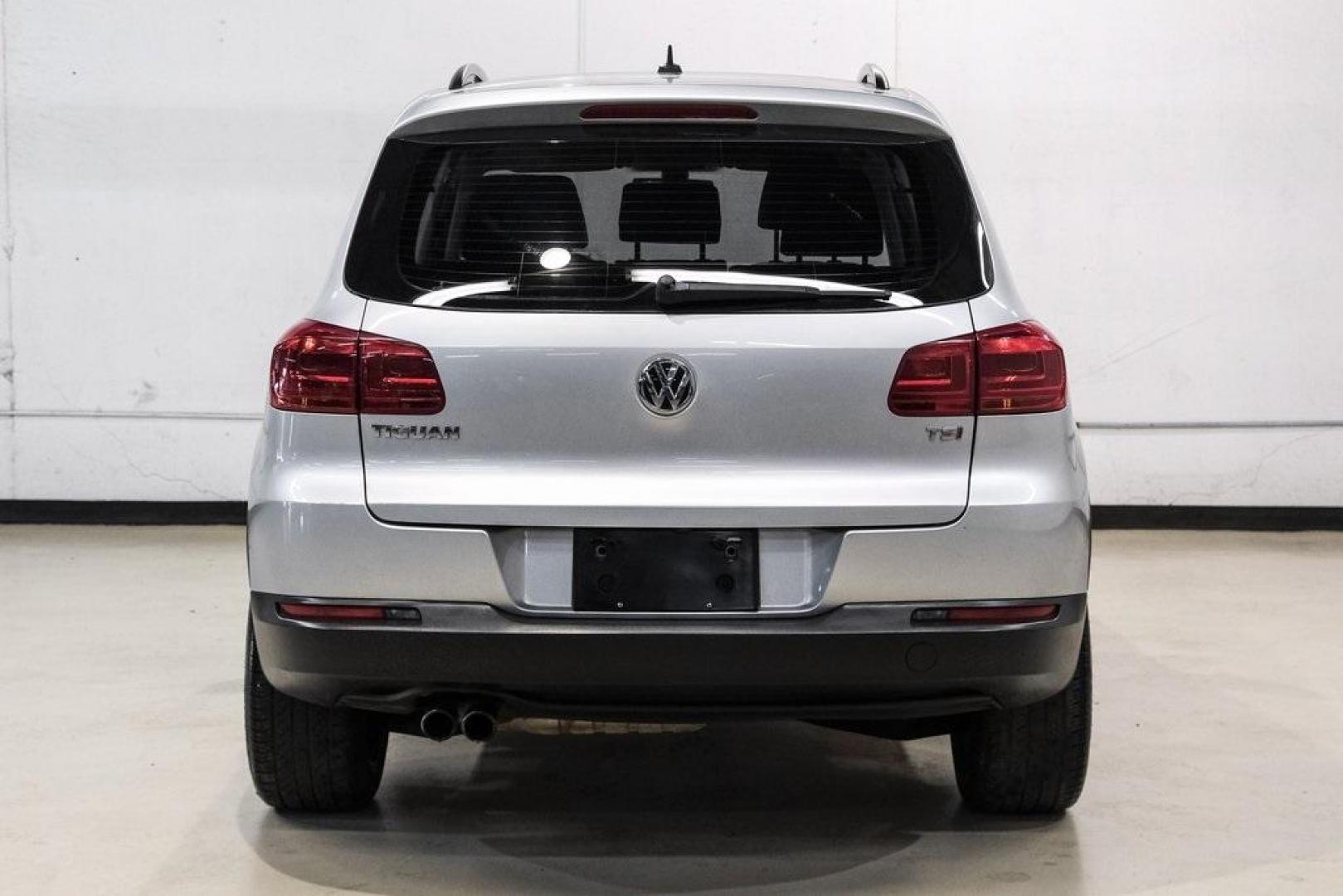 2016 Reflex Silver Metallic Volkswagen Tiguan S (WVGAV7AX0GW) with an 2.0L 4-Cylinder Turbocharged engine, Automatic transmission, located at 15300 Midway Rd., Addison, TX, 75001, (972) 702-0011, 32.958321, -96.838074 - Photo#10
