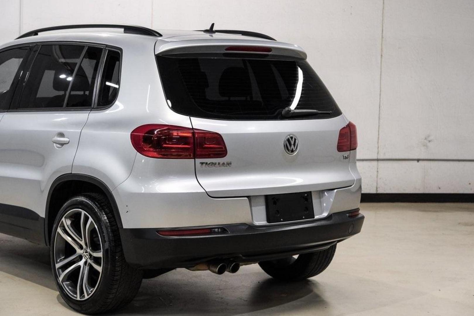 2016 Reflex Silver Metallic Volkswagen Tiguan S (WVGAV7AX0GW) with an 2.0L 4-Cylinder Turbocharged engine, Automatic transmission, located at 15300 Midway Rd., Addison, TX, 75001, (972) 702-0011, 32.958321, -96.838074 - Photo#13