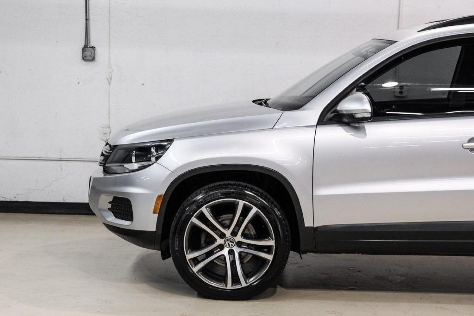 2016 Reflex Silver Metallic Volkswagen Tiguan S (WVGAV7AX0GW) with an 2.0L 4-Cylinder Turbocharged engine, Automatic transmission, located at 15300 Midway Rd., Addison, TX, 75001, (972) 702-0011, 32.958321, -96.838074 - Photo#15