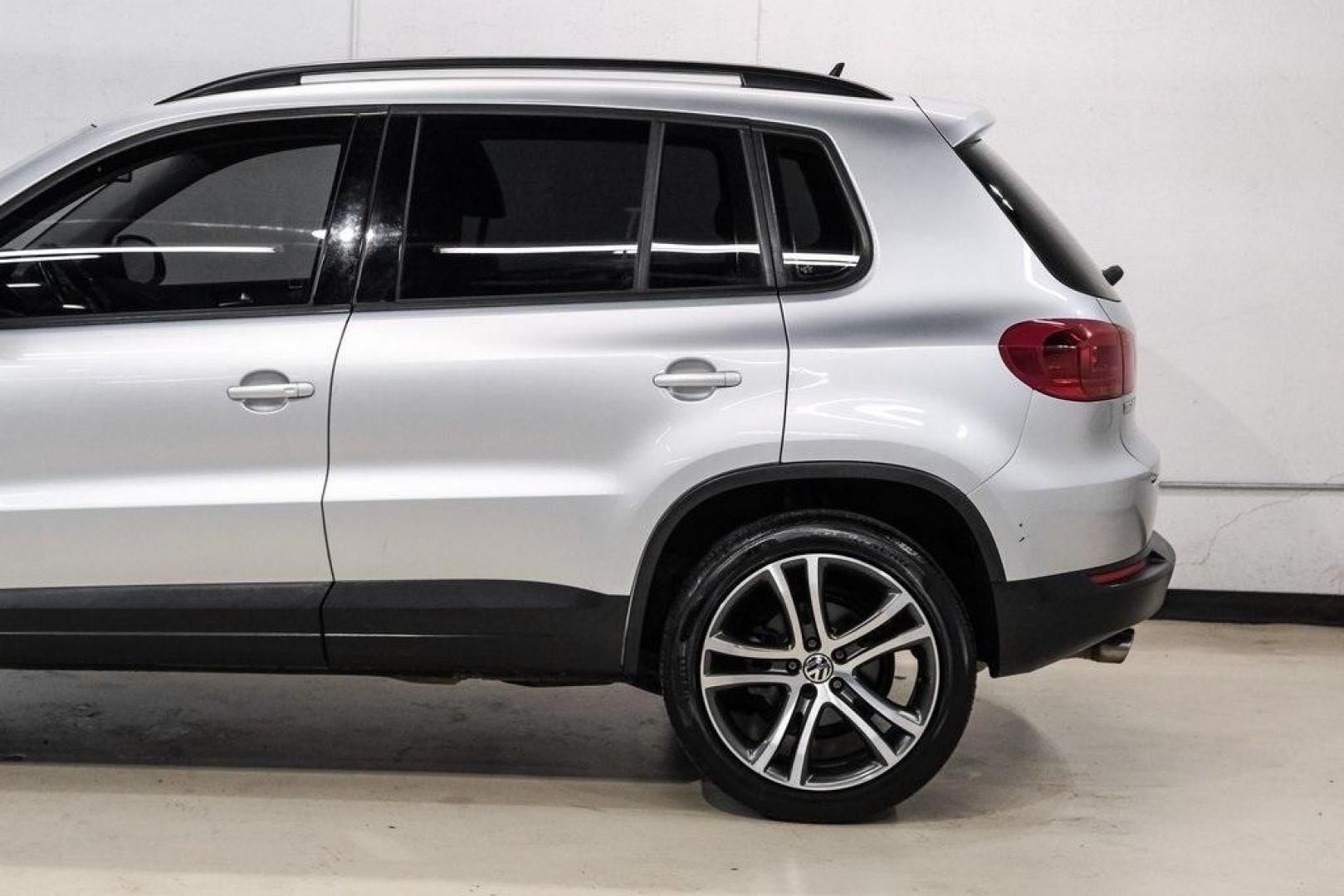 2016 Reflex Silver Metallic Volkswagen Tiguan S (WVGAV7AX0GW) with an 2.0L 4-Cylinder Turbocharged engine, Automatic transmission, located at 15300 Midway Rd., Addison, TX, 75001, (972) 702-0011, 32.958321, -96.838074 - Photo#16