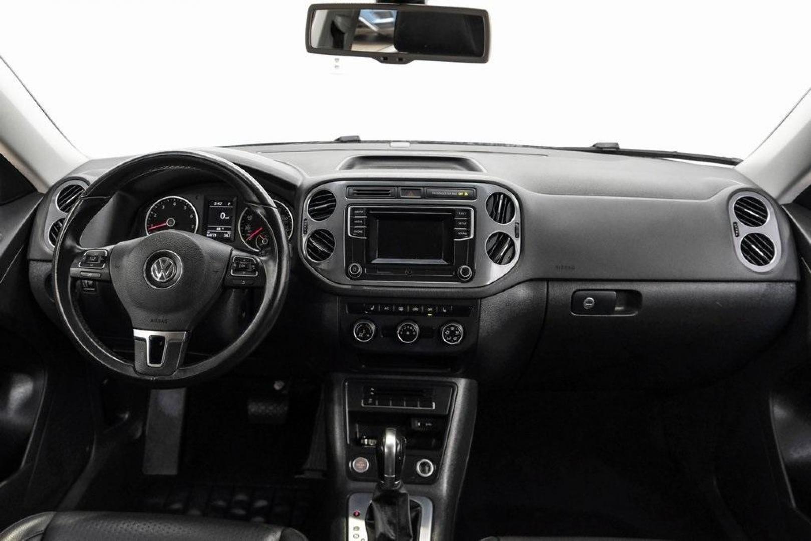 2016 Reflex Silver Metallic Volkswagen Tiguan S (WVGAV7AX0GW) with an 2.0L 4-Cylinder Turbocharged engine, Automatic transmission, located at 15300 Midway Rd., Addison, TX, 75001, (972) 702-0011, 32.958321, -96.838074 - Photo#18