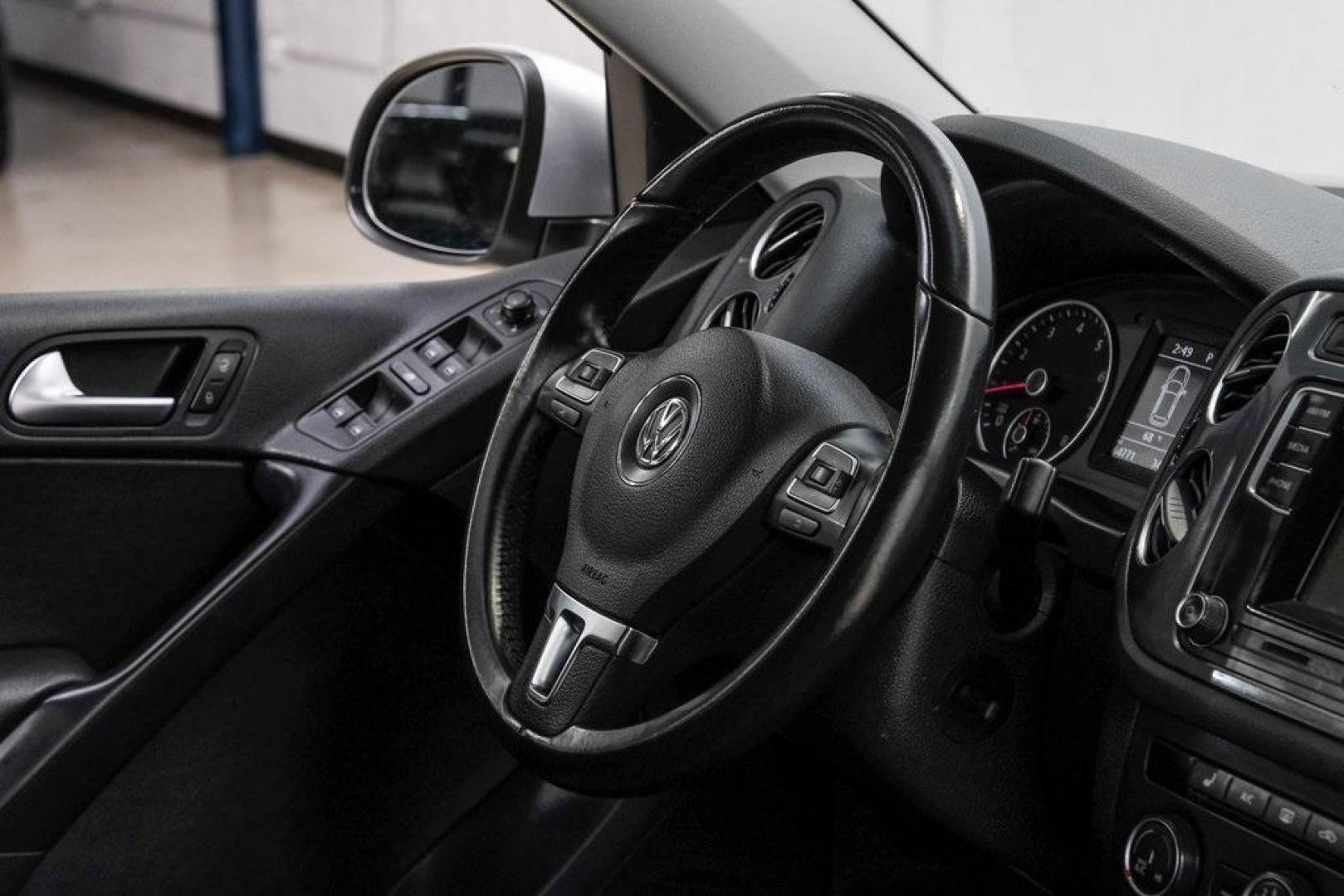 2016 Reflex Silver Metallic Volkswagen Tiguan S (WVGAV7AX0GW) with an 2.0L 4-Cylinder Turbocharged engine, Automatic transmission, located at 15300 Midway Rd., Addison, TX, 75001, (972) 702-0011, 32.958321, -96.838074 - Photo#19