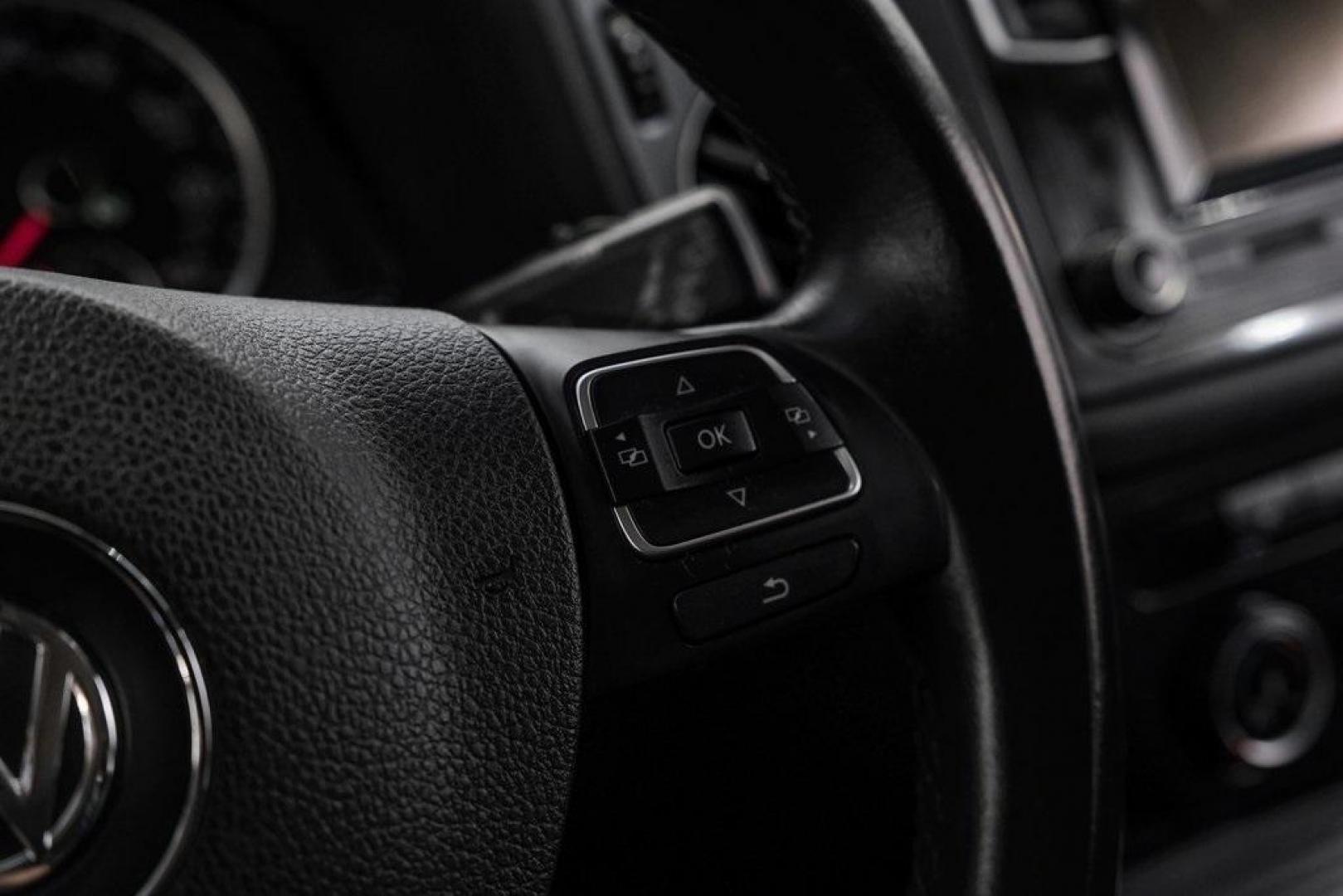 2016 Reflex Silver Metallic Volkswagen Tiguan S (WVGAV7AX0GW) with an 2.0L 4-Cylinder Turbocharged engine, Automatic transmission, located at 15300 Midway Rd., Addison, TX, 75001, (972) 702-0011, 32.958321, -96.838074 - Photo#22