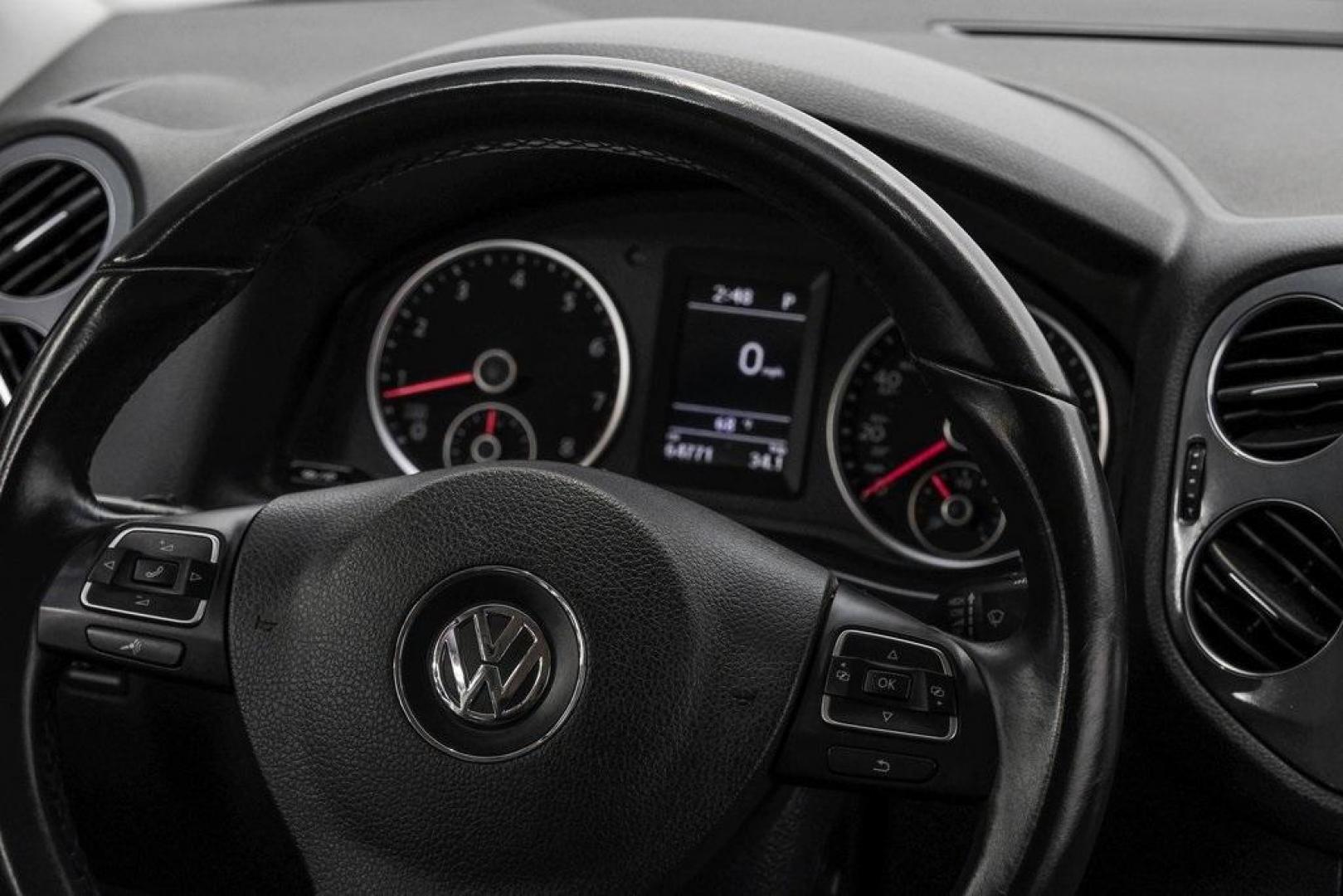 2016 Reflex Silver Metallic Volkswagen Tiguan S (WVGAV7AX0GW) with an 2.0L 4-Cylinder Turbocharged engine, Automatic transmission, located at 15300 Midway Rd., Addison, TX, 75001, (972) 702-0011, 32.958321, -96.838074 - Photo#23