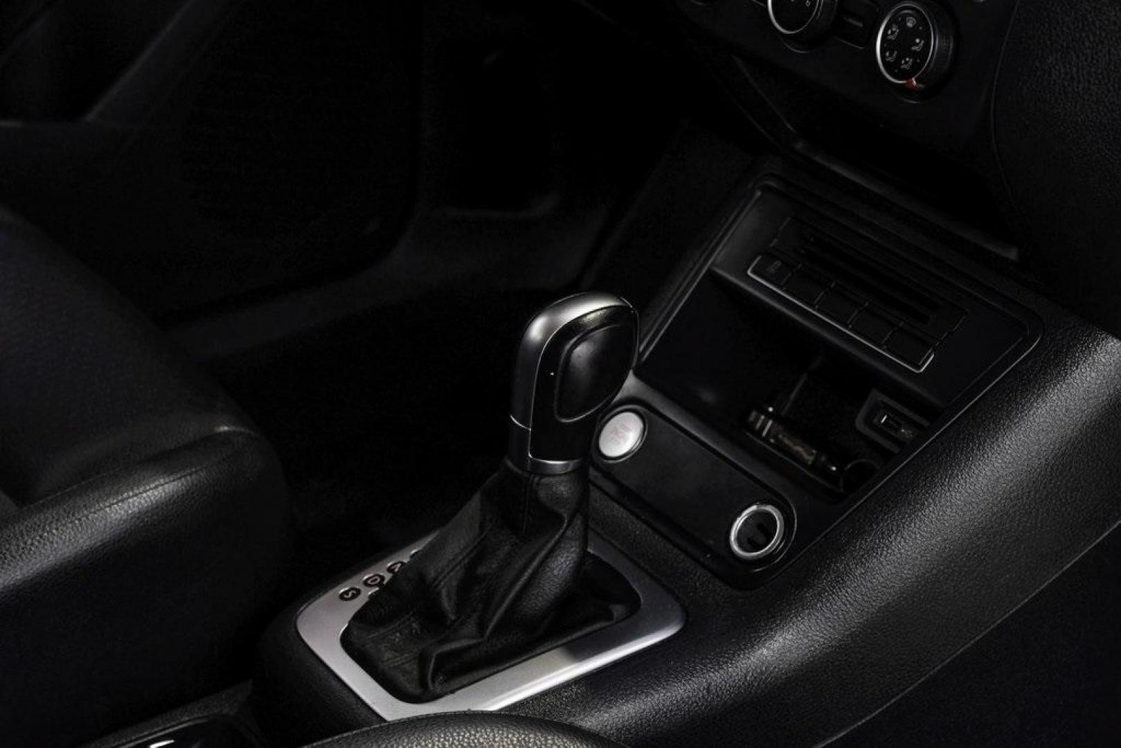 2016 Reflex Silver Metallic Volkswagen Tiguan S (WVGAV7AX0GW) with an 2.0L 4-Cylinder Turbocharged engine, Automatic transmission, located at 15300 Midway Rd., Addison, TX, 75001, (972) 702-0011, 32.958321, -96.838074 - Photo#28