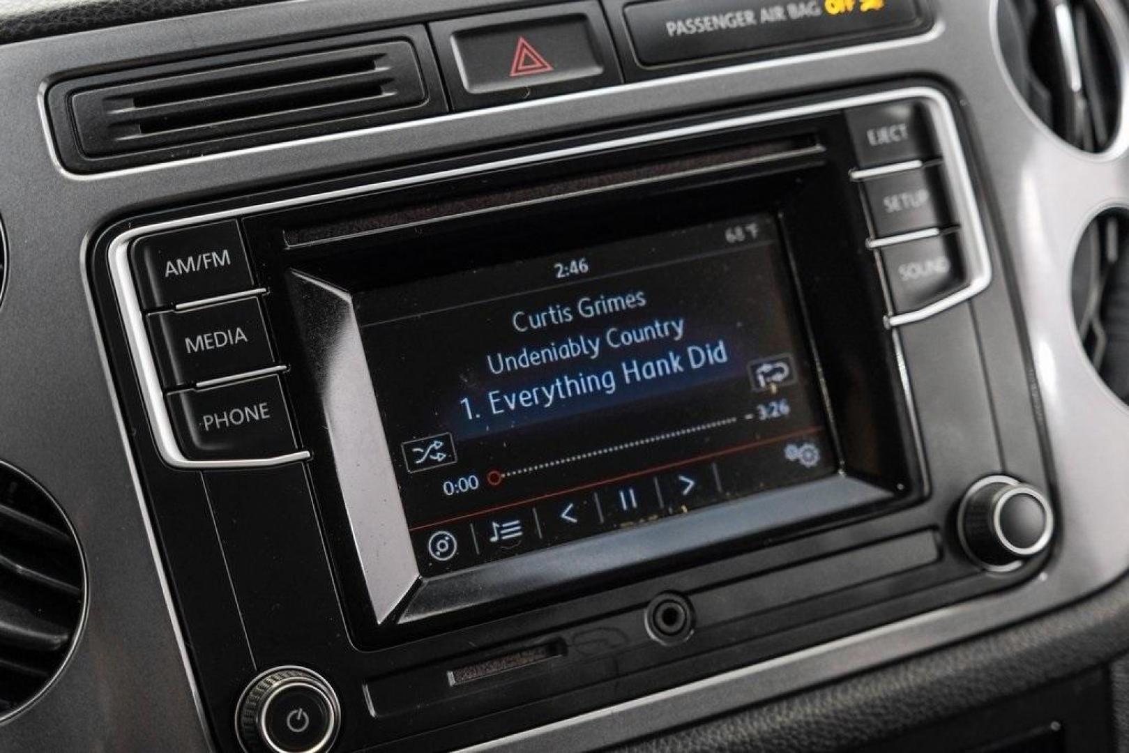 2016 Reflex Silver Metallic Volkswagen Tiguan S (WVGAV7AX0GW) with an 2.0L 4-Cylinder Turbocharged engine, Automatic transmission, located at 15300 Midway Rd., Addison, TX, 75001, (972) 702-0011, 32.958321, -96.838074 - Photo#35