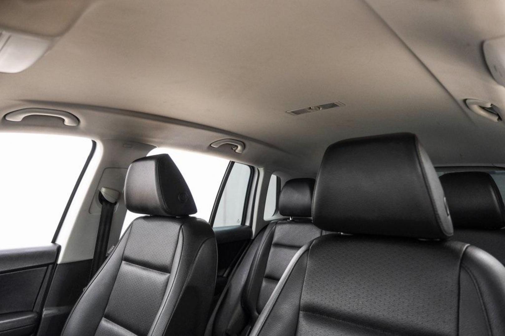 2016 Reflex Silver Metallic Volkswagen Tiguan S (WVGAV7AX0GW) with an 2.0L 4-Cylinder Turbocharged engine, Automatic transmission, located at 15300 Midway Rd., Addison, TX, 75001, (972) 702-0011, 32.958321, -96.838074 - Photo#37