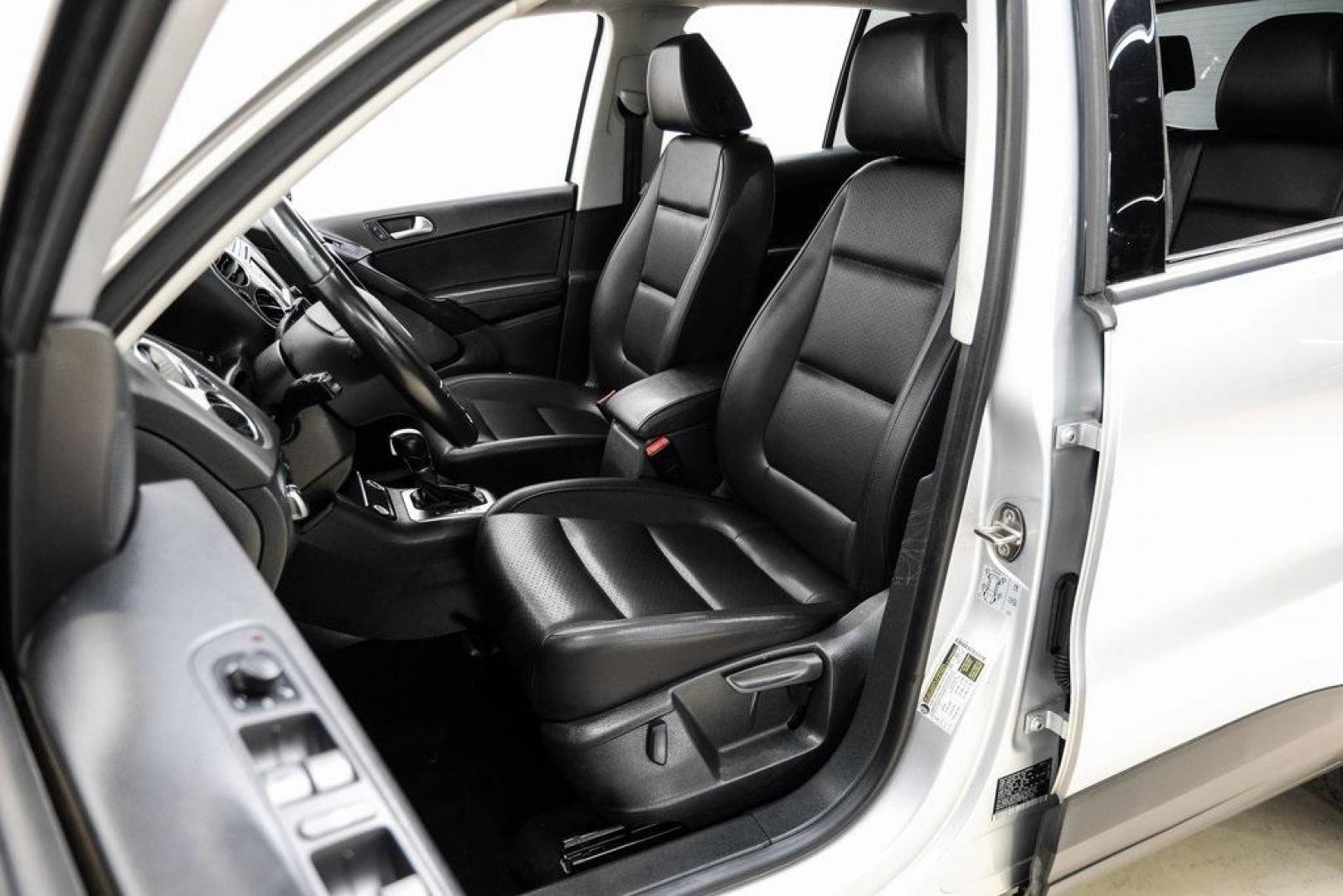 2016 Reflex Silver Metallic Volkswagen Tiguan S (WVGAV7AX0GW) with an 2.0L 4-Cylinder Turbocharged engine, Automatic transmission, located at 15300 Midway Rd., Addison, TX, 75001, (972) 702-0011, 32.958321, -96.838074 - Photo#38