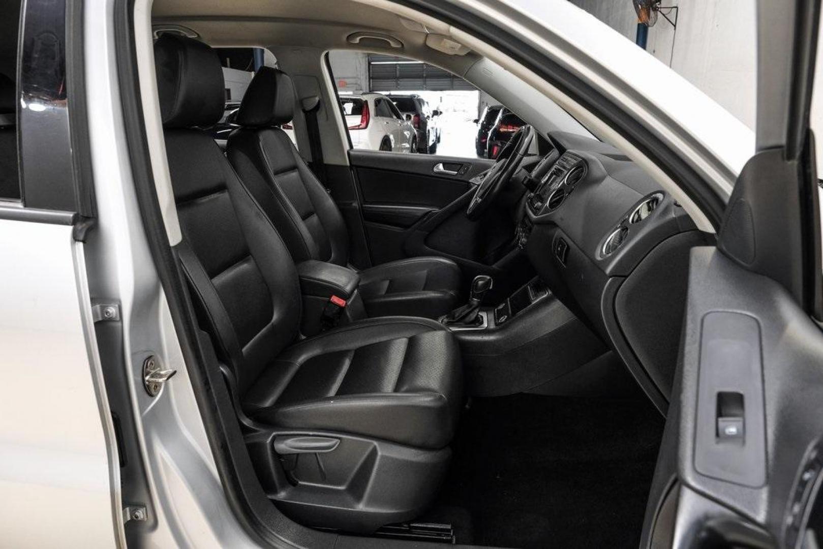 2016 Reflex Silver Metallic Volkswagen Tiguan S (WVGAV7AX0GW) with an 2.0L 4-Cylinder Turbocharged engine, Automatic transmission, located at 15300 Midway Rd., Addison, TX, 75001, (972) 702-0011, 32.958321, -96.838074 - Photo#40